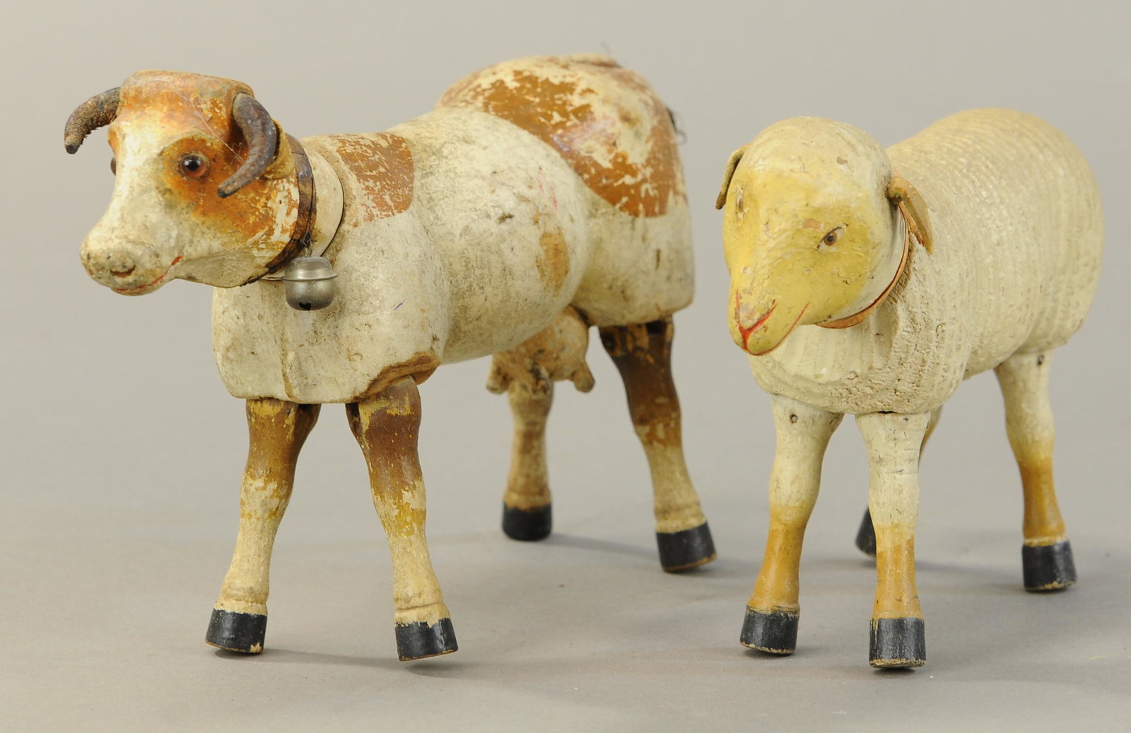 SCHOENHUT COW & SHEEP: 245. SCHOENHUT COW & SHEEP | 7" - 9" l. | Sheep missing tail, otherwise in All Original Condition. | $150 - $300