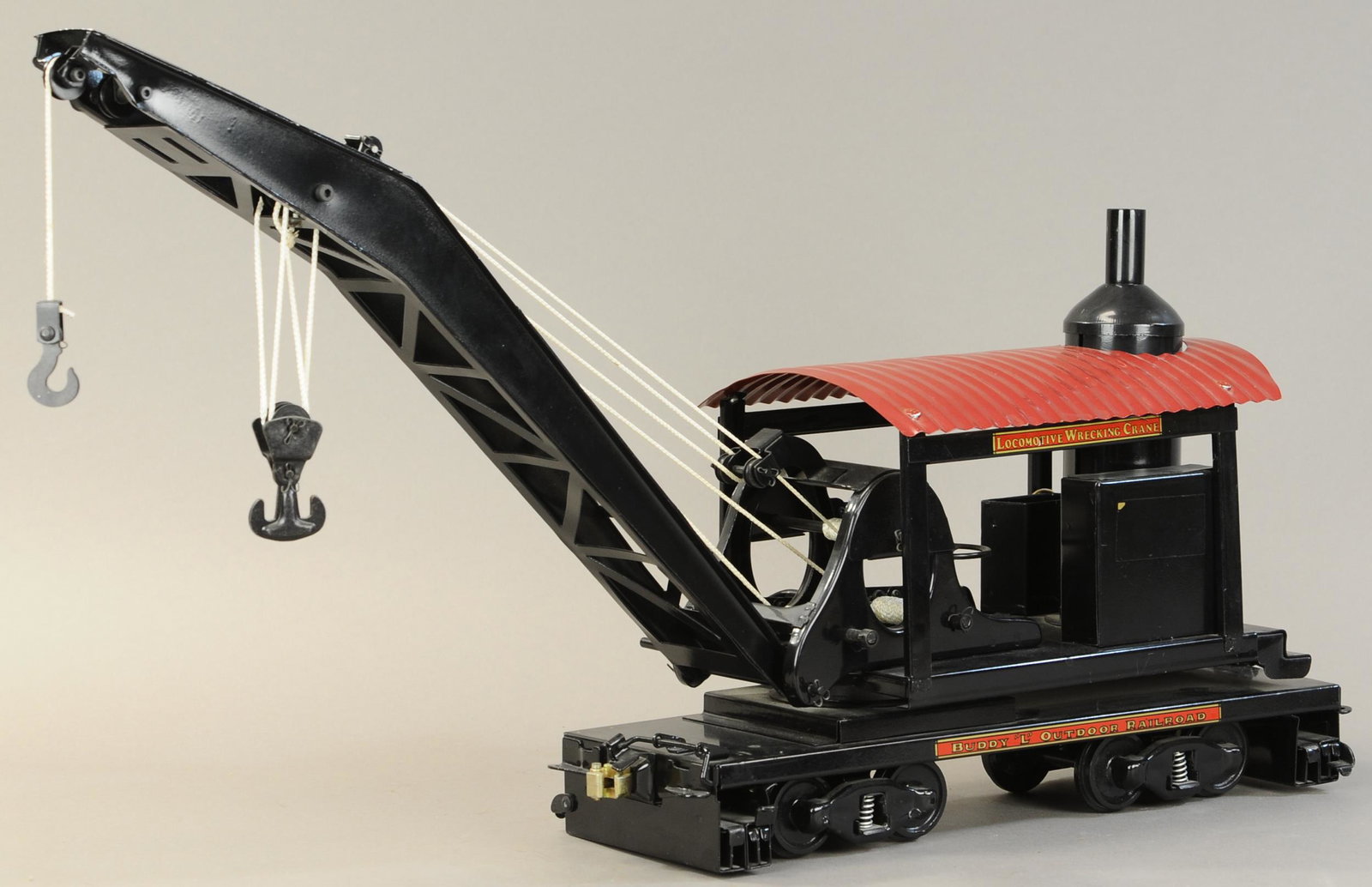 BUDDY L OUTDOOR RR WRECKING CRANE: 313. BUDDY L OUTDOOR RR WRECKING CRANE | 32" l. | Contemporary. | $200 - $400