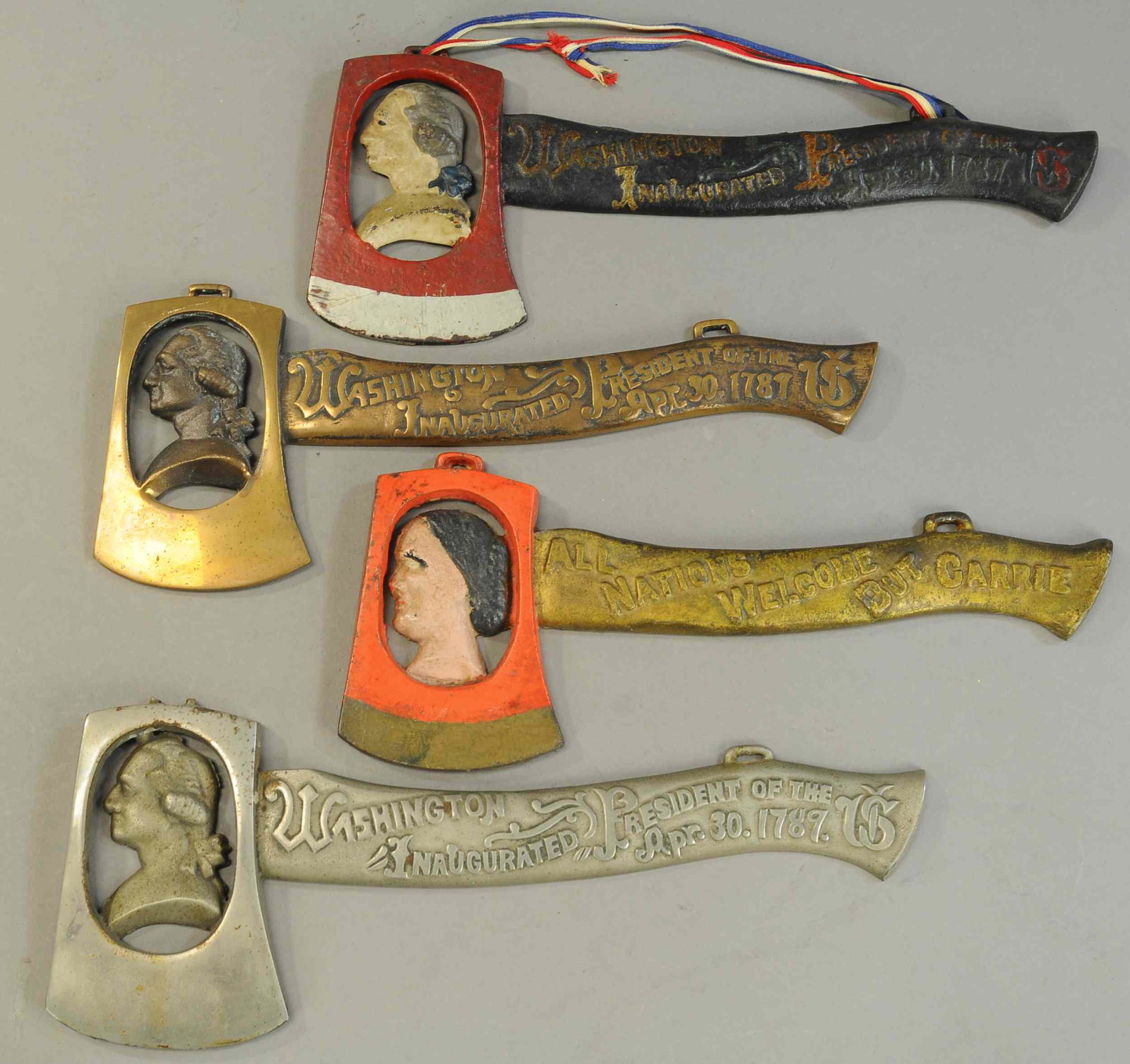 FOUR CAST IRON AXES: 187. FOUR CAST IRON AXES | 13" l. | All Original Condition. | $200 - $400