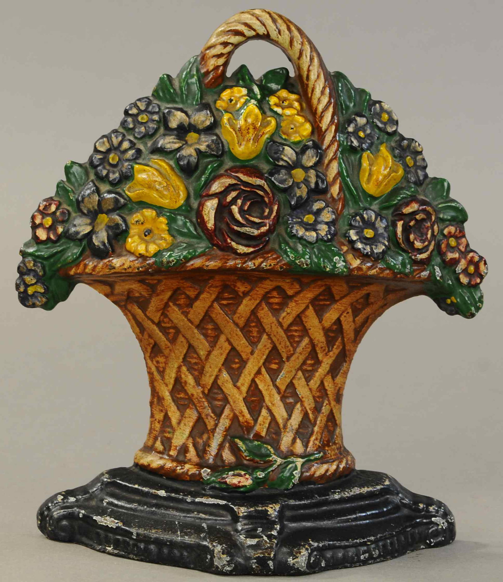 FLOWER BASKET DOORSTOP: 201. FLOWER BASKET DOORSTOP | 9" h. | All Original Condition. | $100 - $200