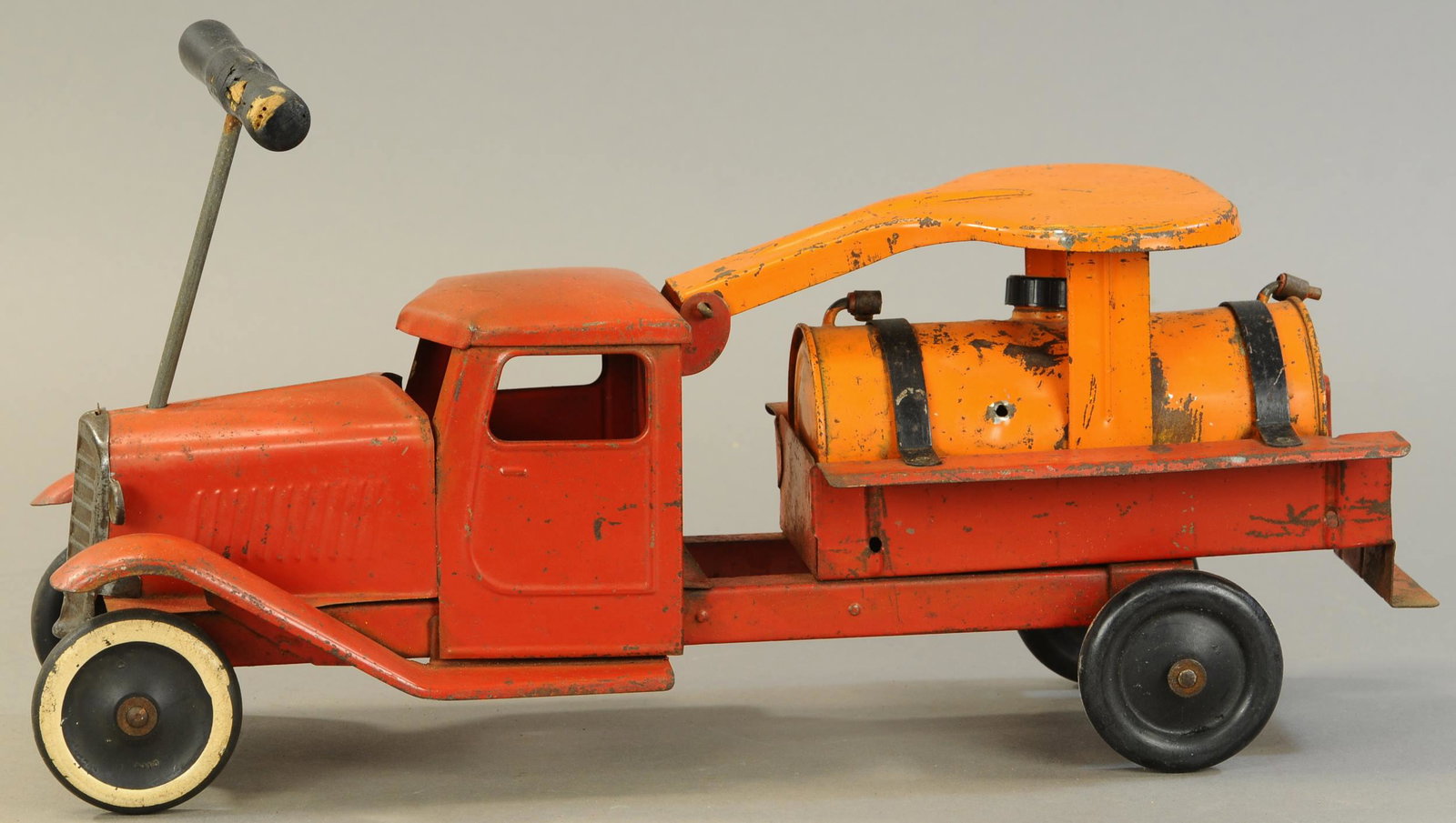 STRUCTO RIDE-ON CHEMICAL TRUCK: 418. STRUCTO RIDE-ON CHEMICAL TRUCK | 20" l. | All paint appears to be original, though the bed and chassis appear to be assembled together. | $250 - $500