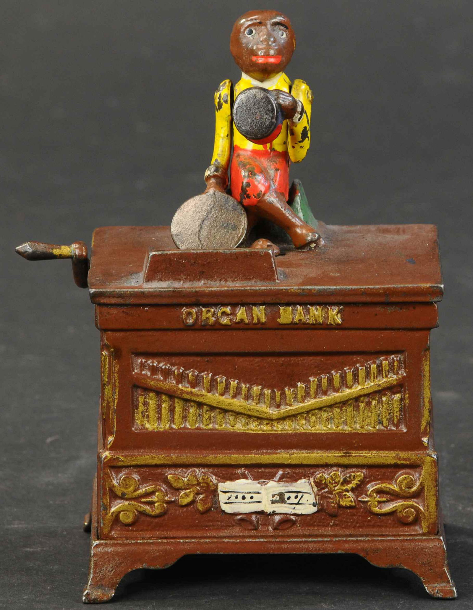MEDIUM ORGAN BANK MECHANICAL BANK: 101. MEDIUM ORGAN BANK MECHANICAL BANK | Kyser & Rex Co. medium size bank of three size variations produced. | (Excellent to Pristine Condition) | $800 - $1,200