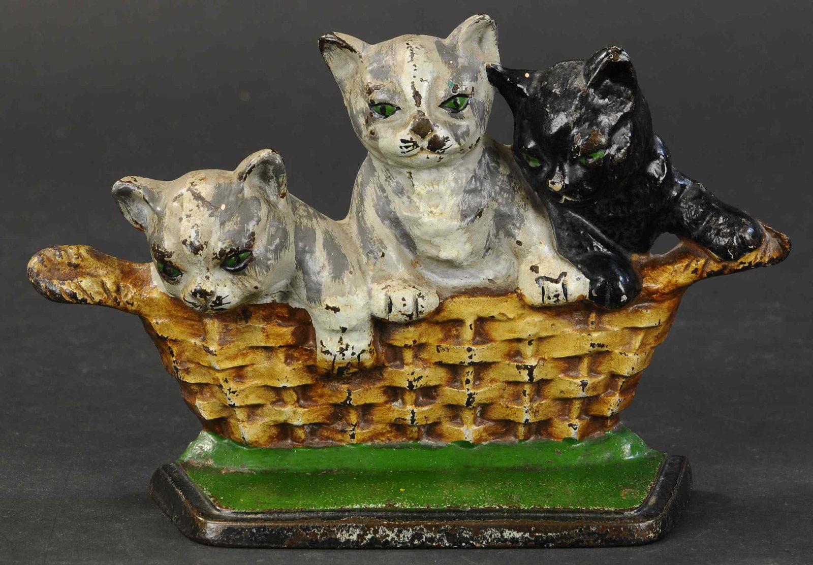 KITTENS IN A BASKET DOORSTOP: 163. KITTENS IN A BASKET DOORSTOP | Three kittens playing in a basket, beautiful detailed casting, heart warming theme, signed "Copyright 1932 M. Rosenstein, Lancaster, PA USA." 10" l. | (Excellent Co
