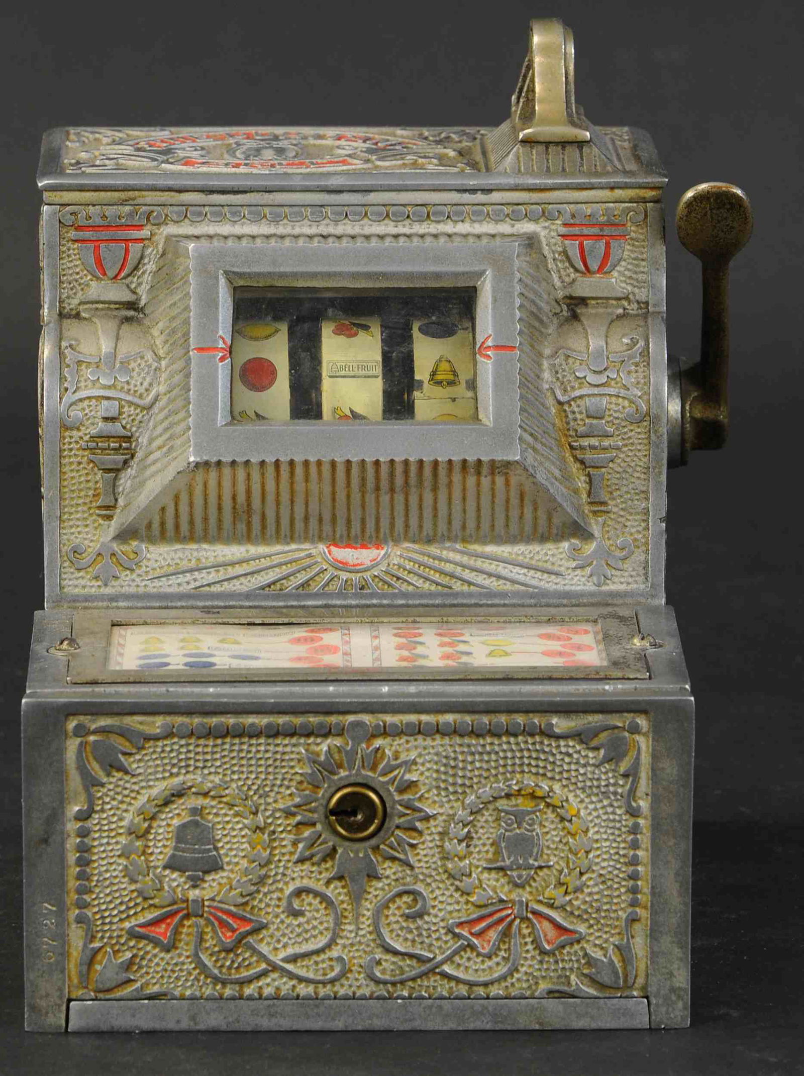 PURITAN BELL SLOT MACHINE: 459. PURITAN BELL SLOT MACHINE | A five cent play machine, aluminum case, excellent working condition with keys. 9" x 10" x 9" | (Excellent Condition) | $600 - $900