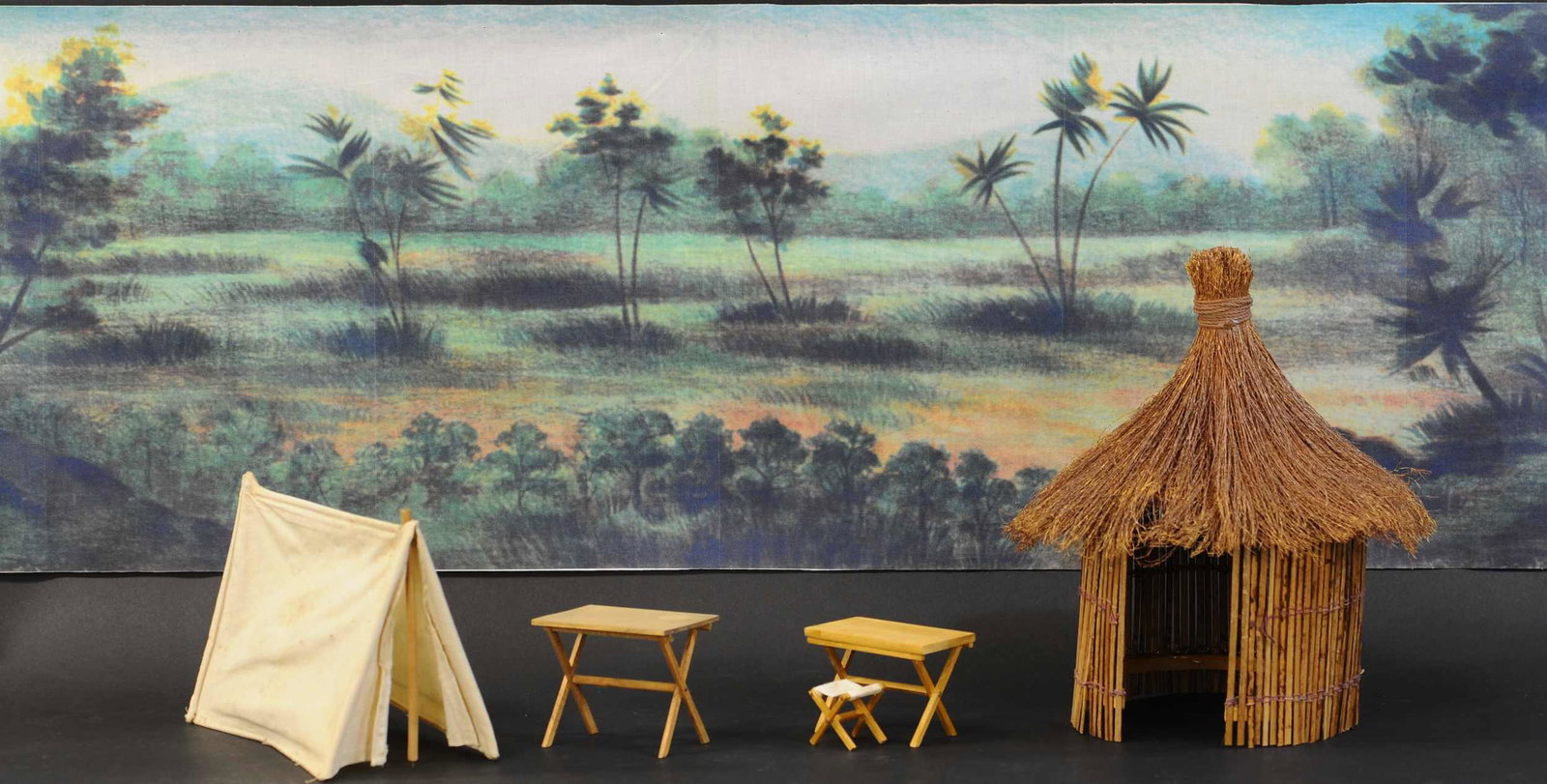 TEDDY ROOSEVELT'S ADVENTURES IN AFRICA PROPS: 493. TEDDY ROOSEVELT'S ADVENTURES IN AFRICA PROPS | Schoenhut, camp tent & tables, grass hut, with scenic back drop. Hut 13" h. | (Very Good Condition) | $300 - $600