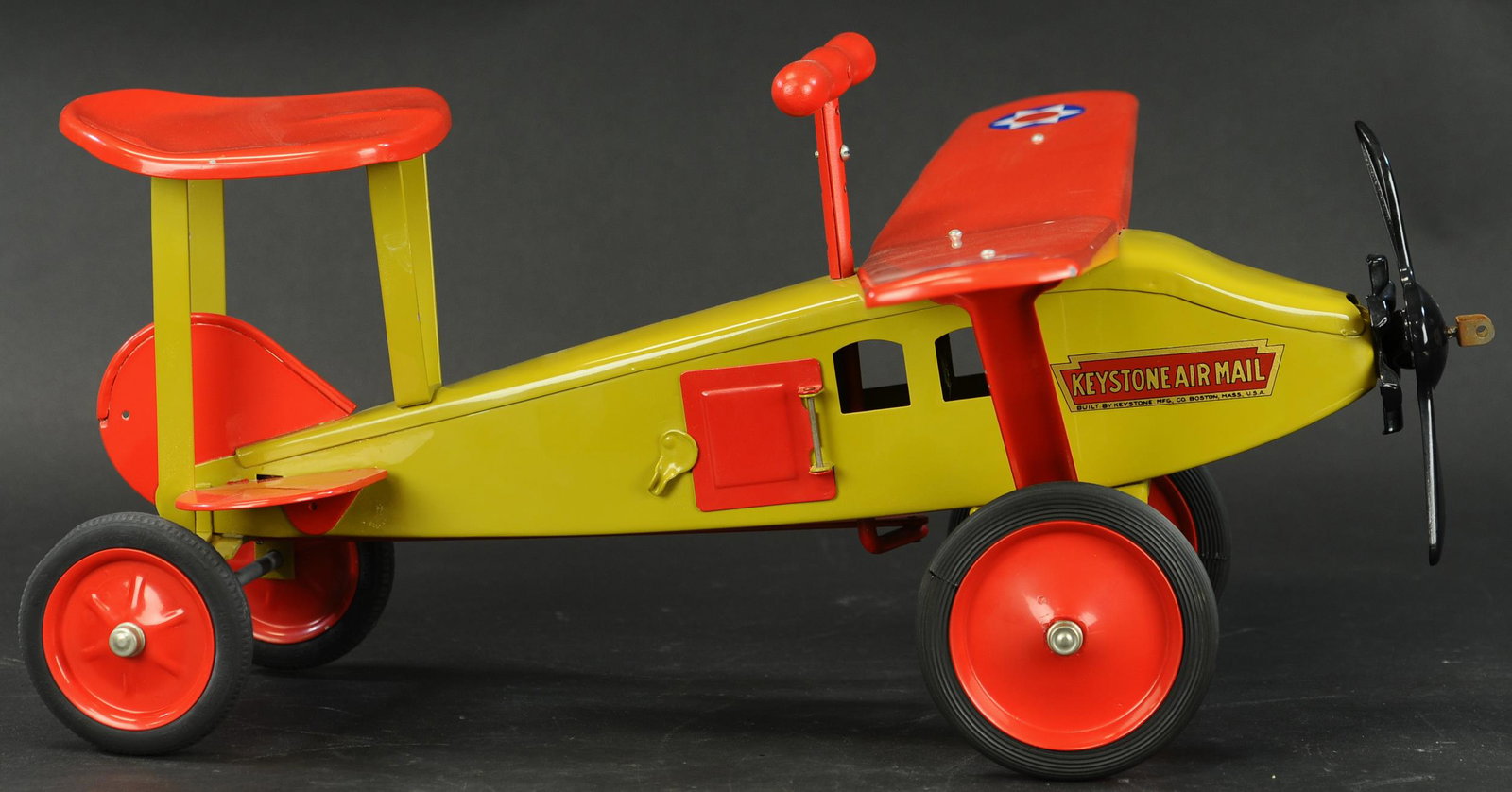NEW ERA KEYSTONE AIRMAIL PLANE RIDE-ON: 575. NEW ERA KEYSTONE AIRMAIL PLANE RIDE-ON | 24" l. | Contemporary, Near Mint. | $200 - $400