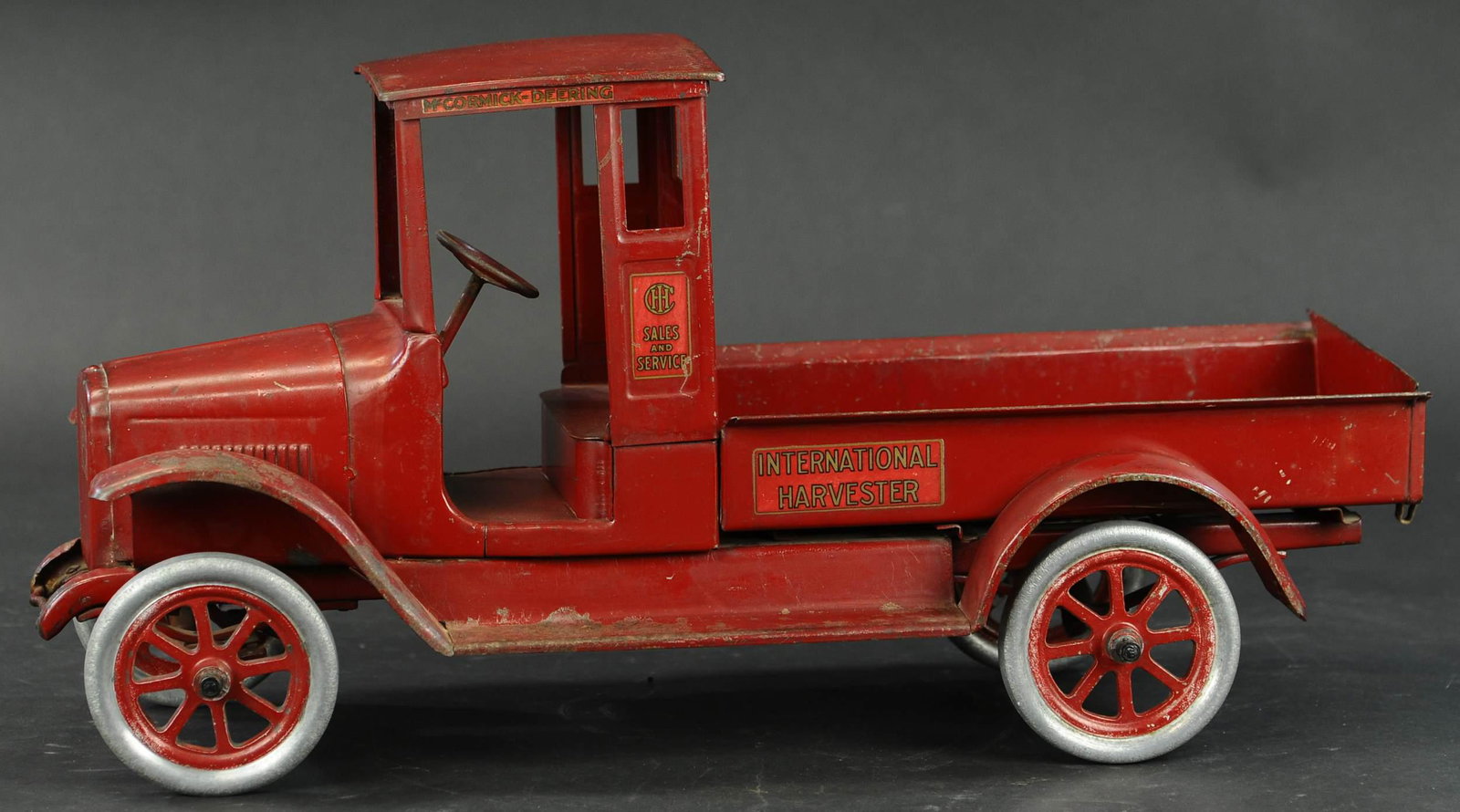 BUDDY L INTERNATIONAL HARVESTER RED BABY DUMP: 589. BUDDY L INTERNATIONAL HARVESTER RED BABY DUMP | 24" l. | (Very Good to Excellent Condition) | $1,500 - $2,500