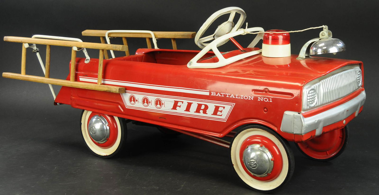 BATTALION #1 FIRE TRUCK PEDAL CAR: 613. BATTALION #1 FIRE TRUCK PEDAL CAR | 40" l. | Ladders and decals are added, paint in (Excellent Condition) | $400 - $600