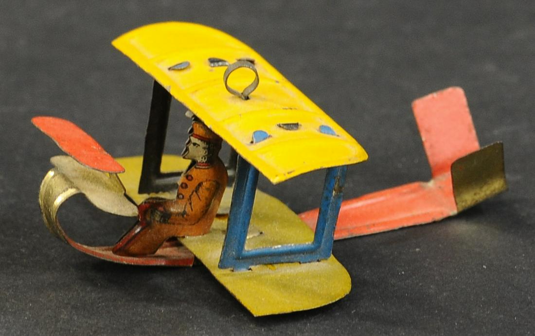 BI-WING AIRPLANE PENNY TOY (1 of 3)