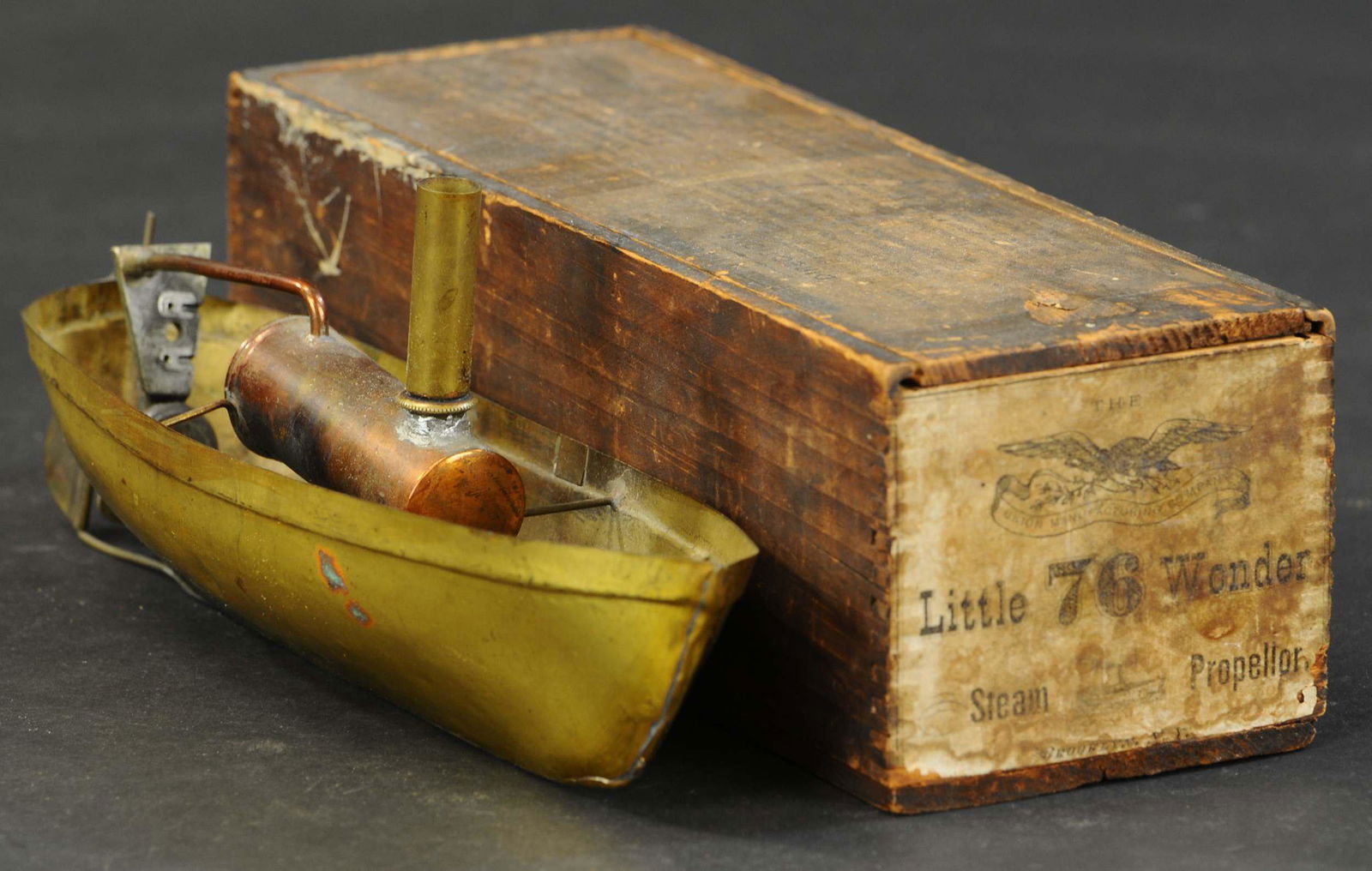 BOXED UNION LITTLE WONDER 76 BOAT: 1185. BOXED UNION LITTLE WONDER 76 BOAT | 9" l. | Mechanism appears incomplete, overall in (Very Good to Excellent Condition) | $400 - $600