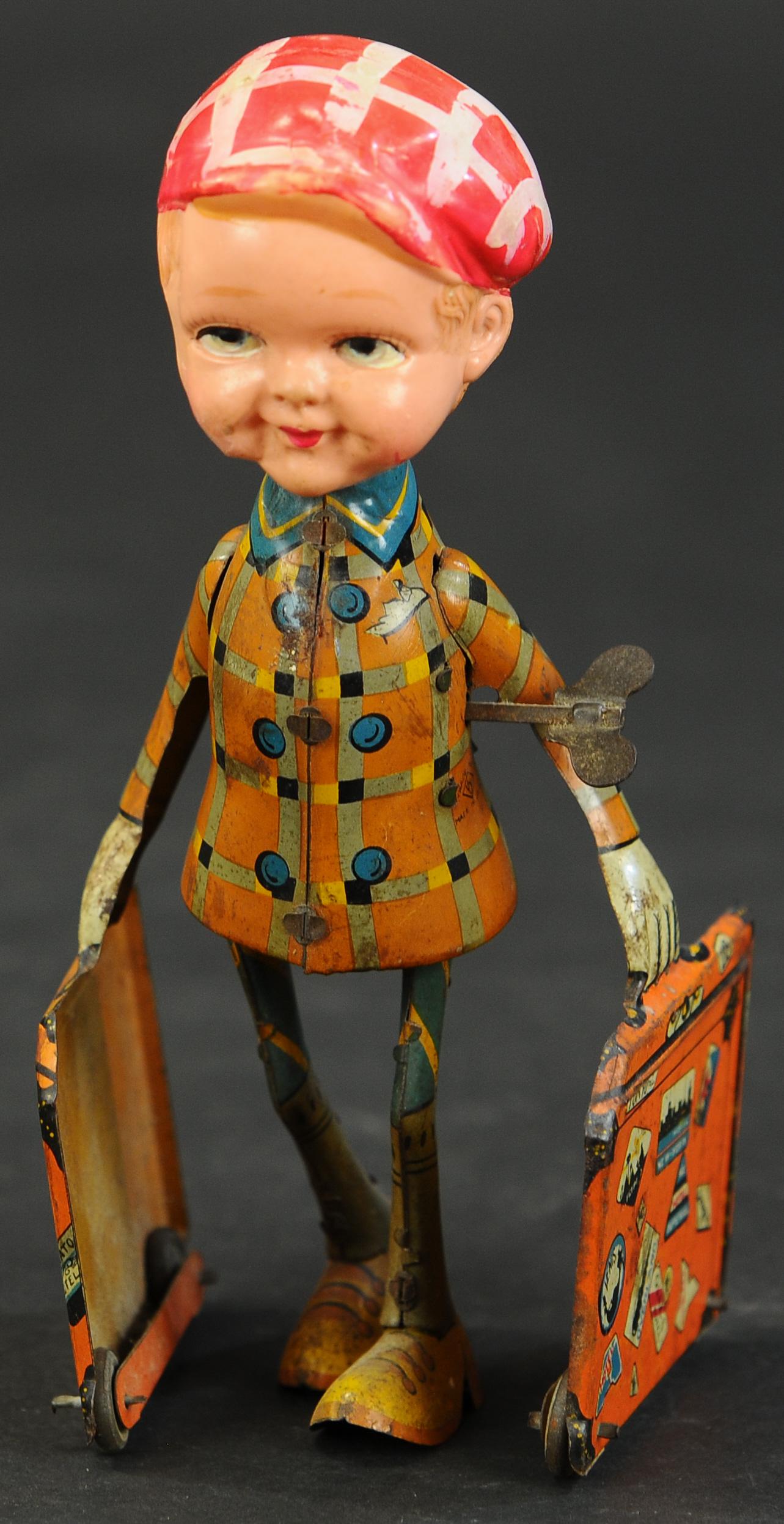 CELLULOID HEAD BOY CARING SUITCASES (1 of 3)