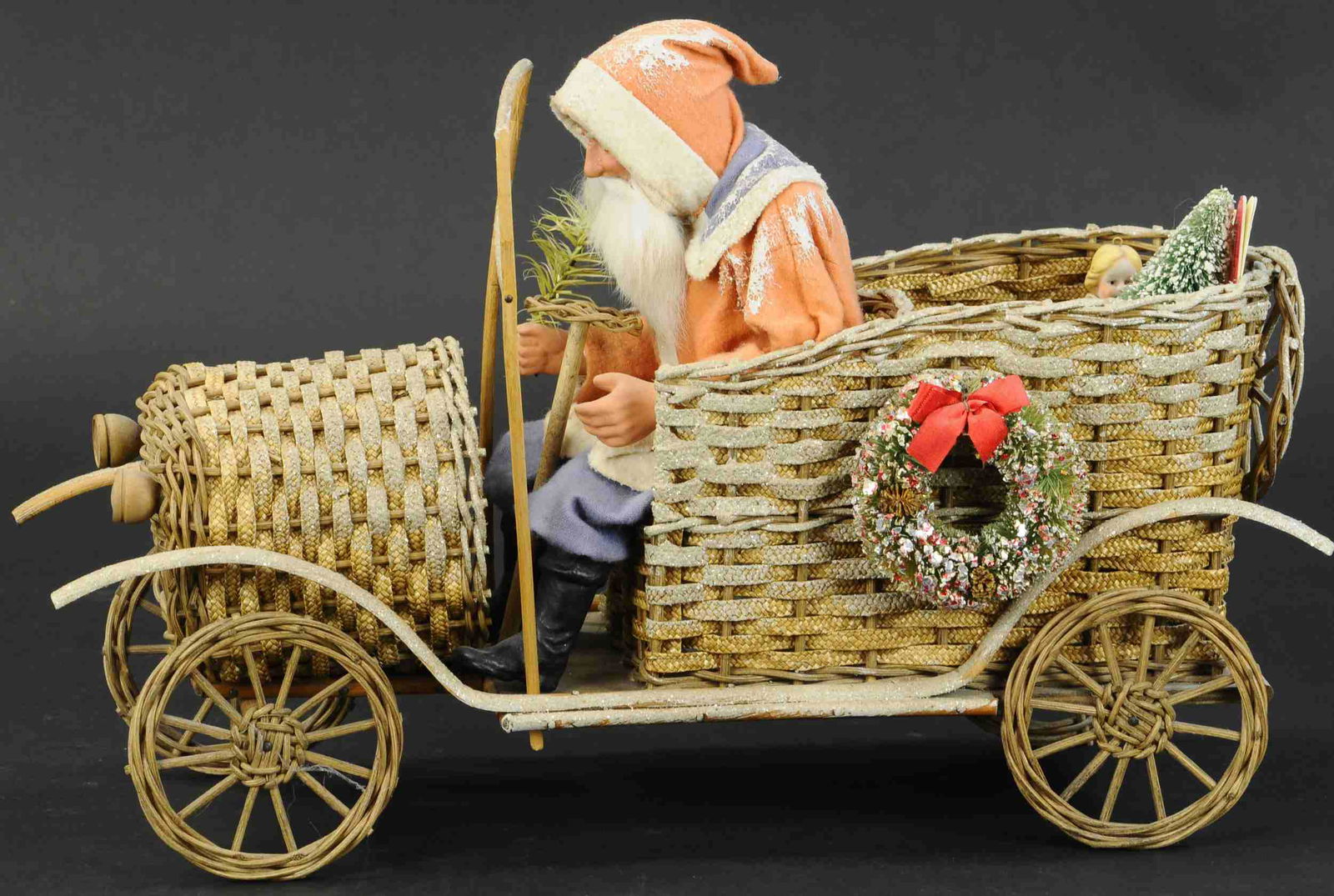 CONTEMPORARY SANTA IN WICKER AUTOMOBILE (1 of 3)