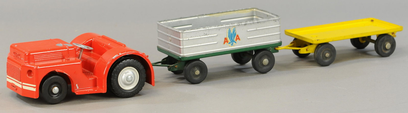 DOEPKE MODEL TOYS AIRPORT TRACTOR: 56. DOEPKE MODEL TOYS AIRPORT TRACTOR | 27" l. | All Original Condition. | $125 - $250