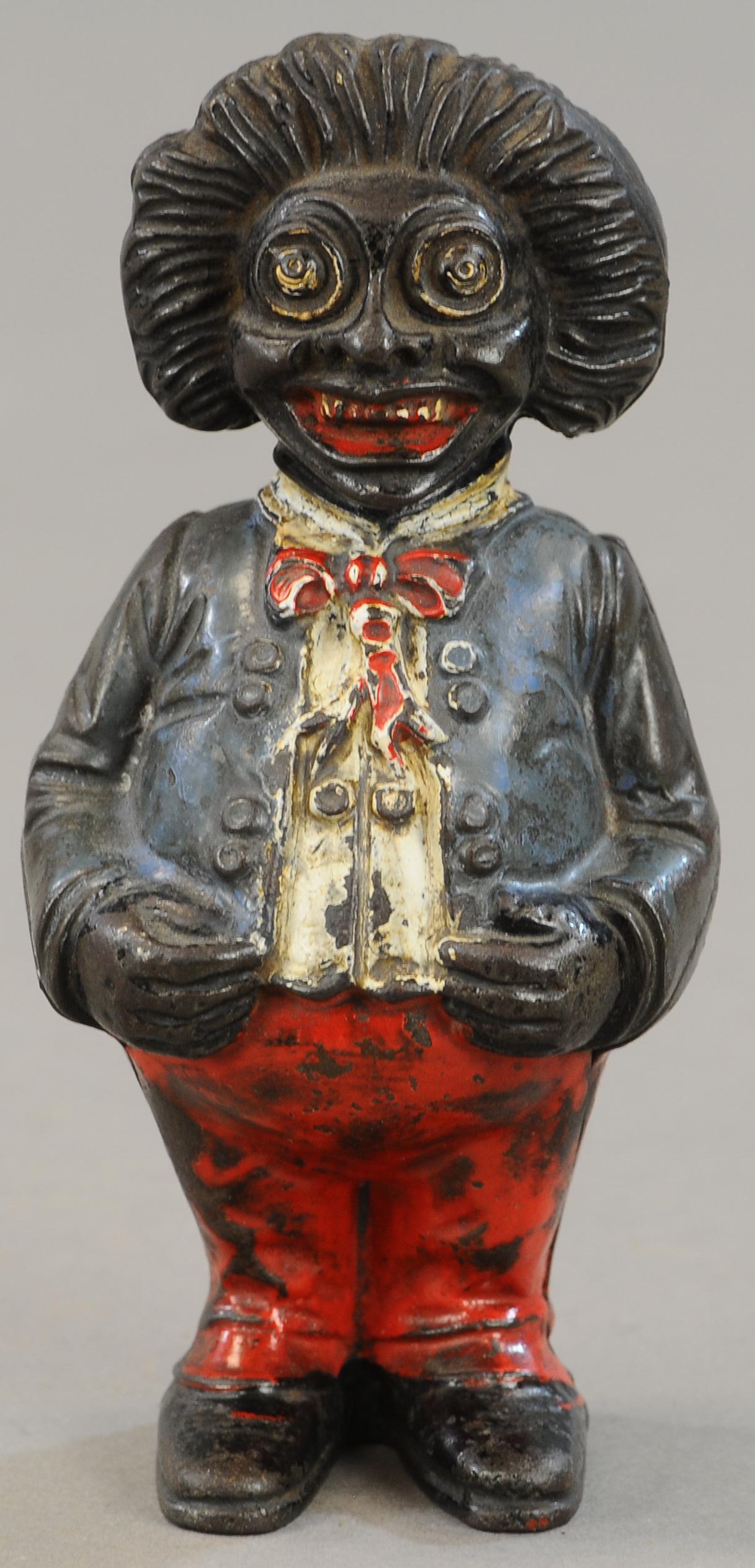 GOLLIWOG STILL BANK: 62. GOLLIWOG STILL BANK | John Harper Ltd. | 6" h. | (VG - Exc. Cond.) | $200 - $400