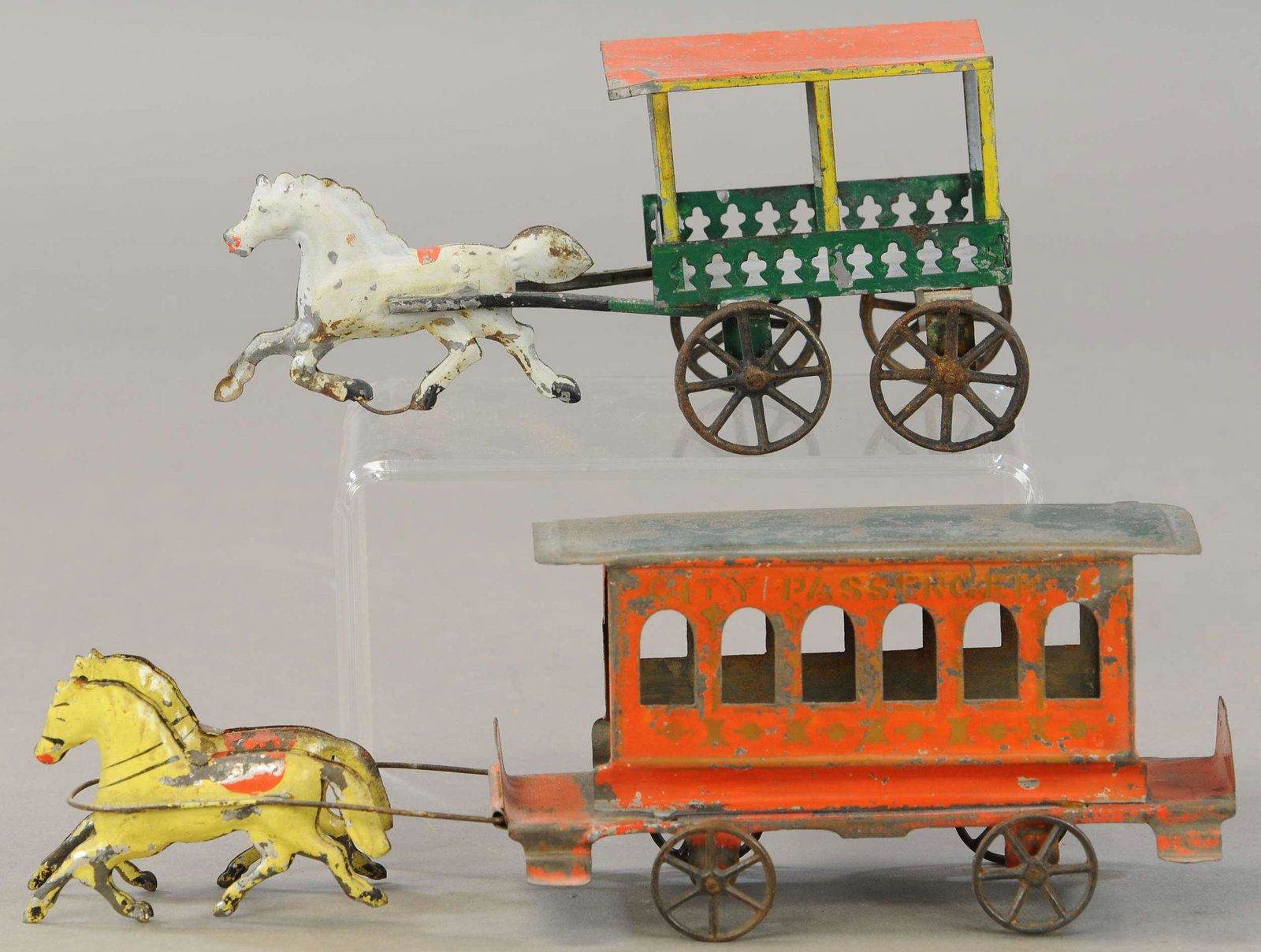 TWO EARLY AMERICAN HORSE CARTS: 263. TWO EARLY AMERICAN HORSE CARTS | 8.5" - 12.5" l. | Roof on surrey is restored, otherwise both appear to be in All Original Condition. | $300 - $600