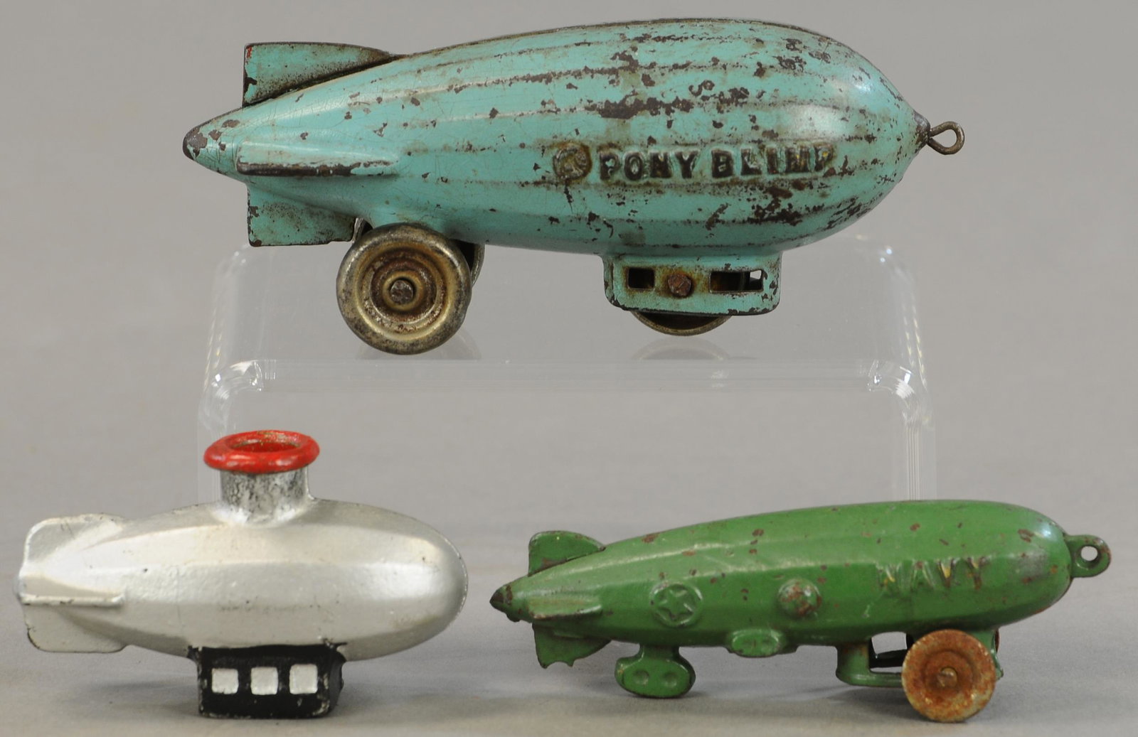 THREE AIRSHIP ZEPPELINS: 296. THREE AIRSHIP ZEPPELINS | 3" - 6" l. | All Original Condition. | $200 - $400