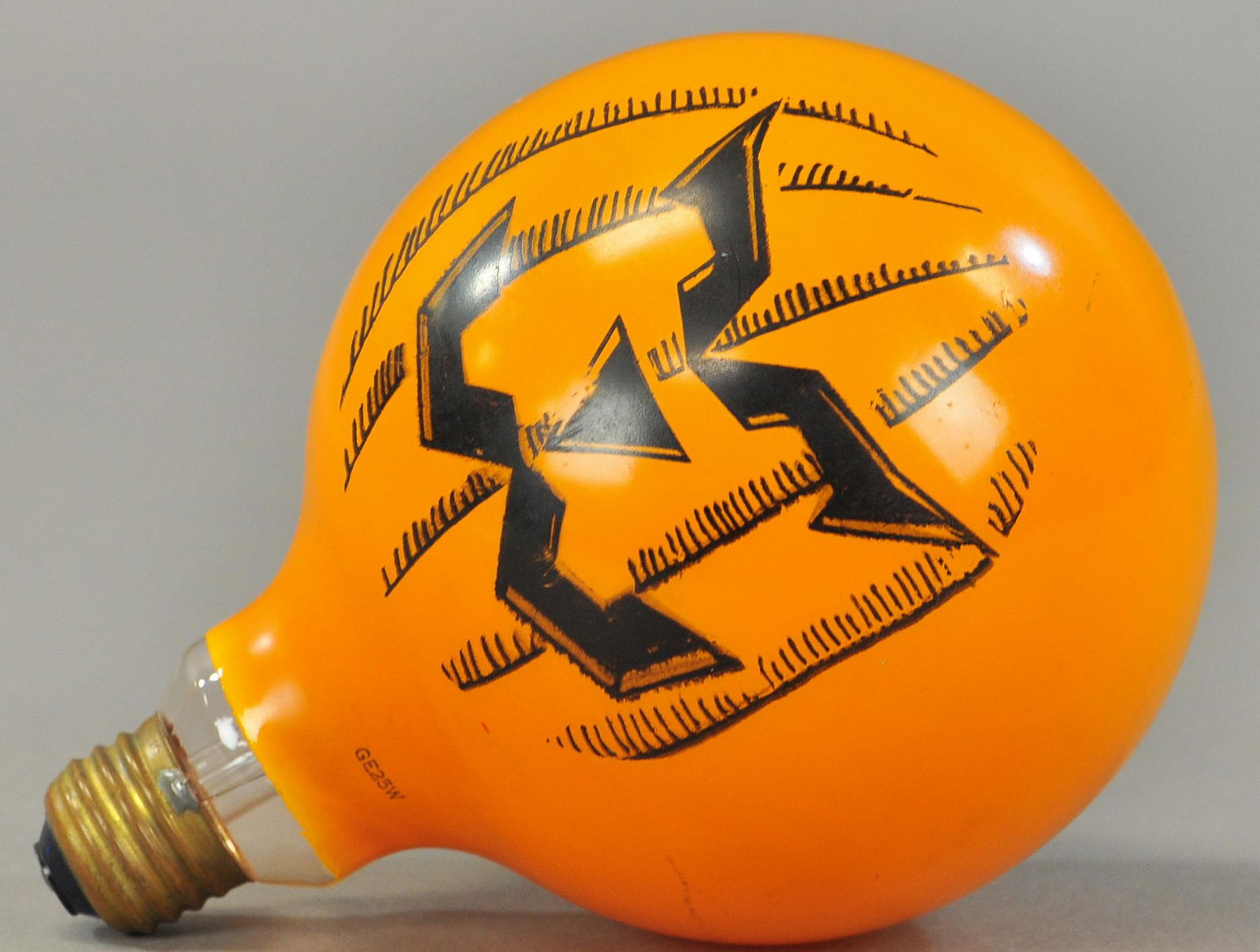 JACK-O-LANTERN LIGHT BULB: 444. JACK-O-LANTERN LIGHT BULB | 7" h. | All Original Condition. | $50 - $100
