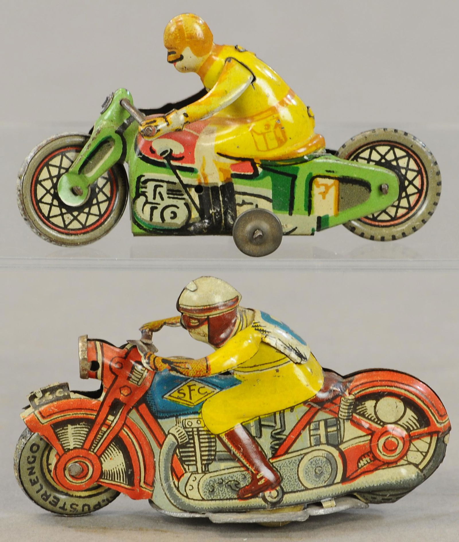 TWO MOTORCYCLE PENNY TOYS (1 of 3)