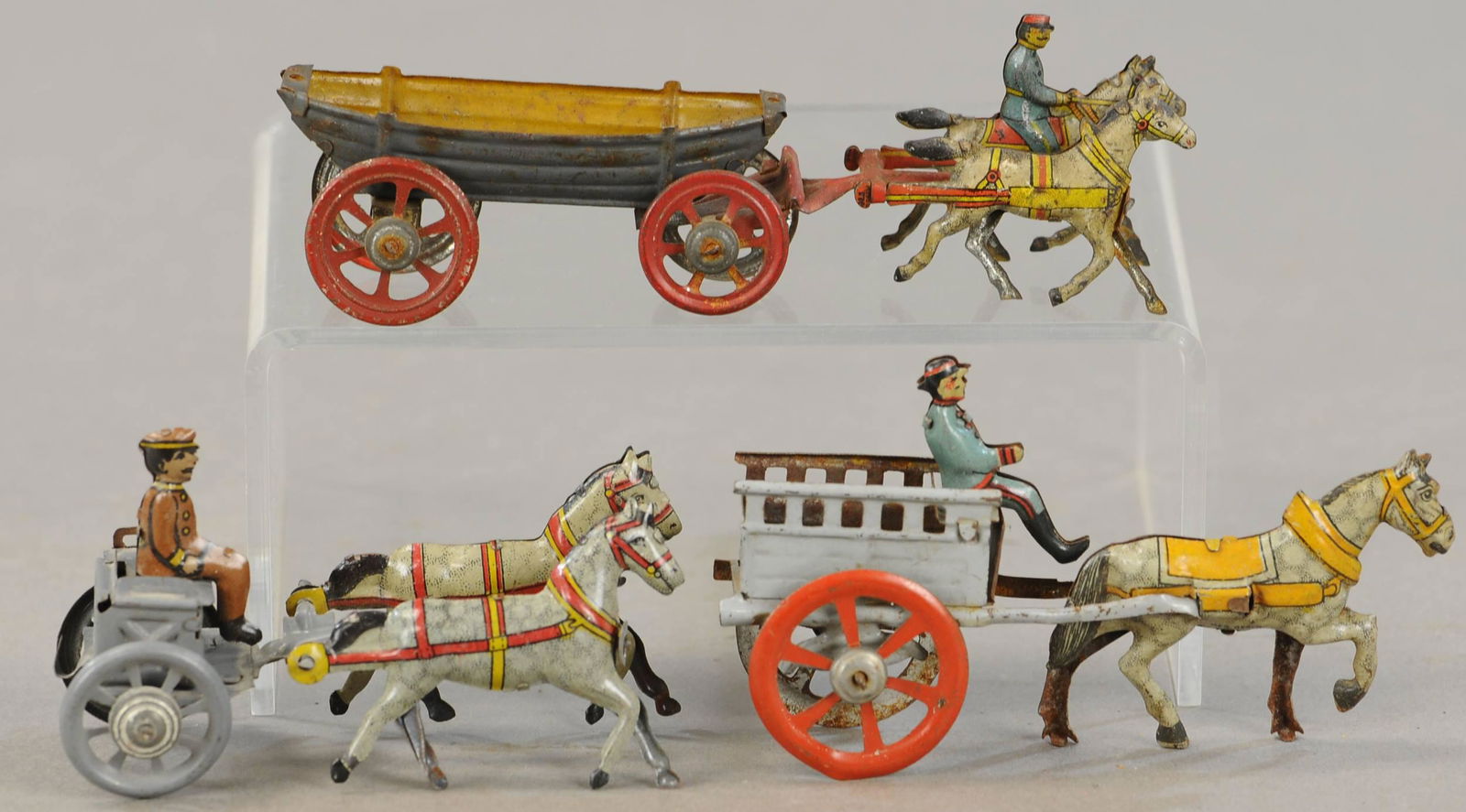 THREE HORSE DRAWN PENNY TOYS: 100. THREE HORSE DRAWN PENNY TOYS | 3" - 5" l | All Original Condition. | $150 - $300