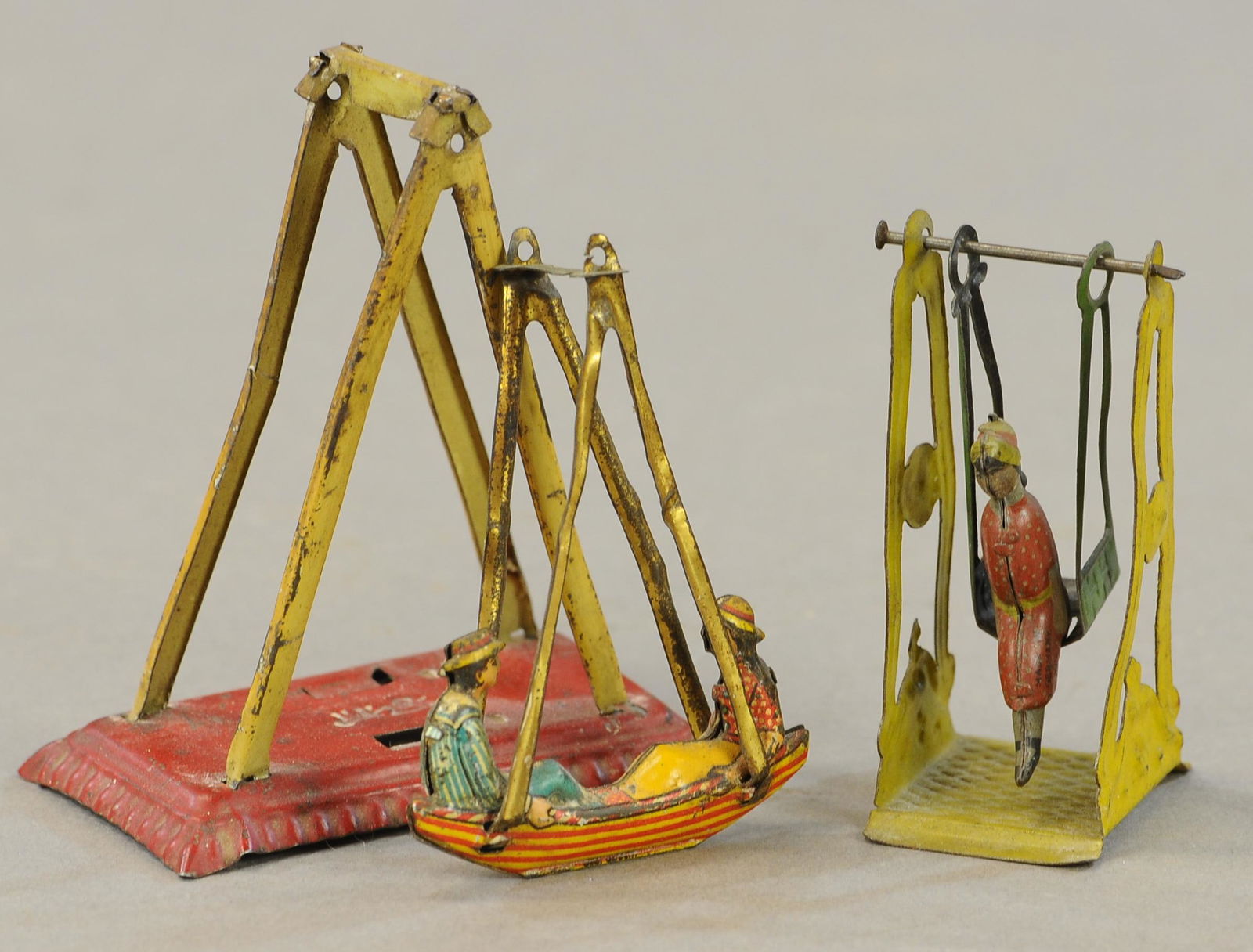 TWO PENNY TOY SWINGS (1 of 2)