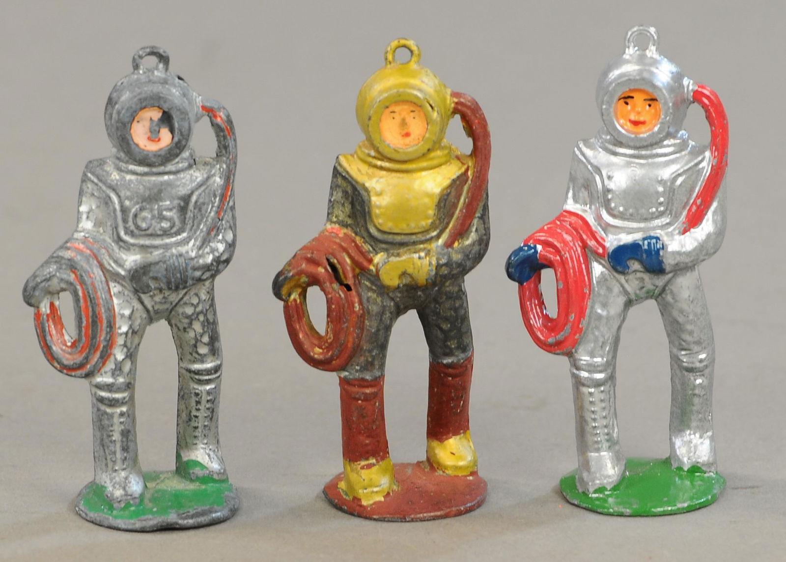 THREE DEEP SEA DIVER FIGURES (1 of 3)