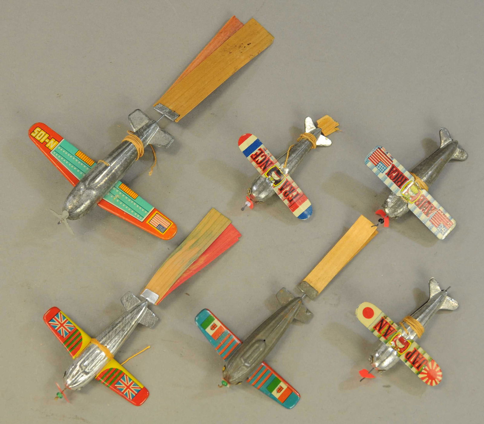 SIX SMALL JAPANESE AIRPLANE TOYS (1 of 3)