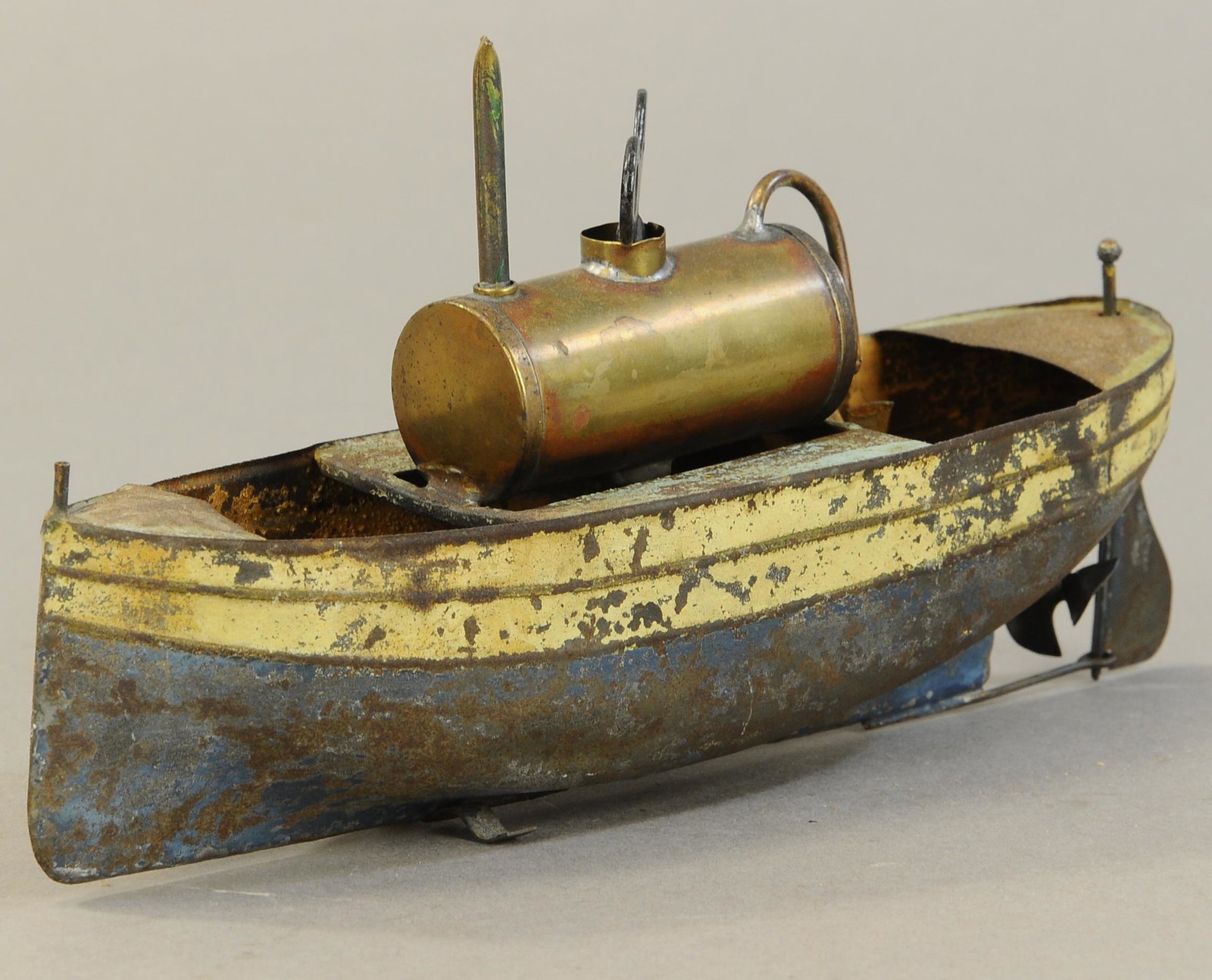 STEAM LAUNCH W/ ROTATING GEAR: 246. STEAM LAUNCH W/ ROTATING GEAR | Clever design causes steam to push out of rear exhaust line and spin a windmill type flywheel which as a result spins propeller. | 10" l. | Flaking to paint, All O