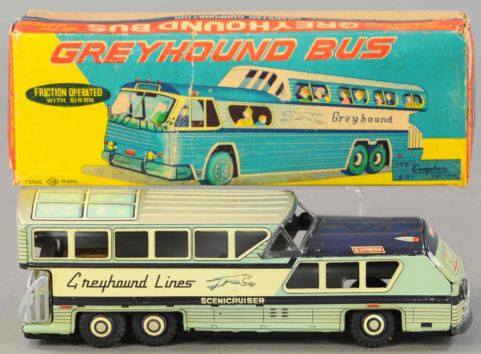 BOXED NORMUA JAPAN GREYHOUND BUS: 399. BOXED NORMUA JAPAN GREYHOUND BUS | 11" l. | Some distress to box, toy in All Original Condition. | $200 - $400