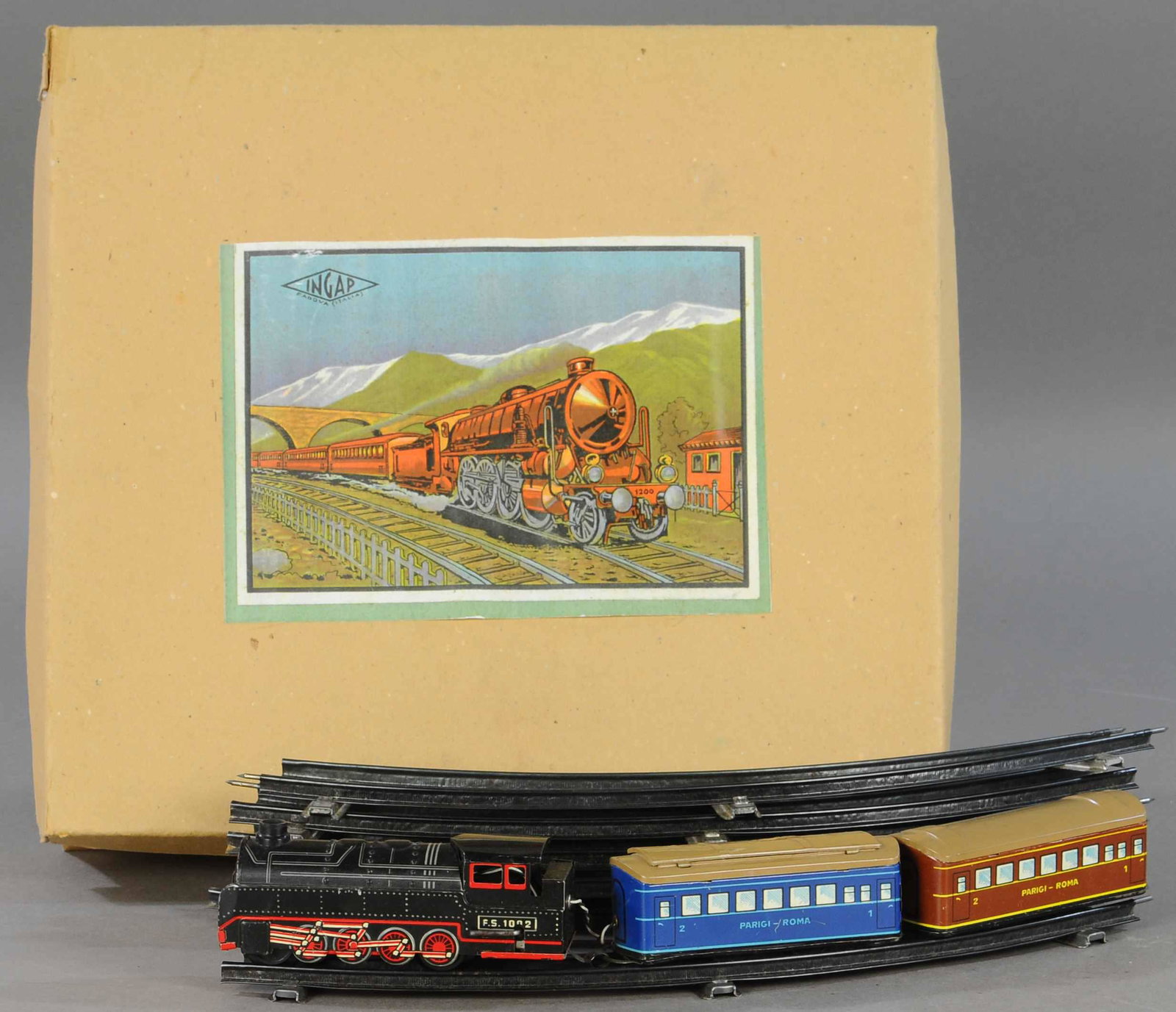 INGAP ITALIAN TRAIN SET: 25. INGAP ITALIAN TRAIN SET | " l. | Box is a reproduction, toy in All Original Condition. | $200 - $400