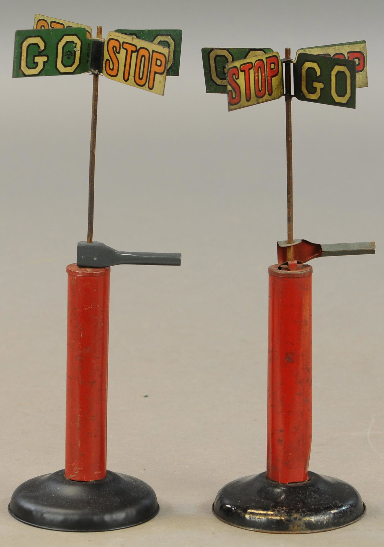 TWO STOP & GO TRAFFIC SIGNALS: 142. TWO STOP & GO TRAFFIC SIGNALS | 10" h. | All Original Condition. | $100 - $200