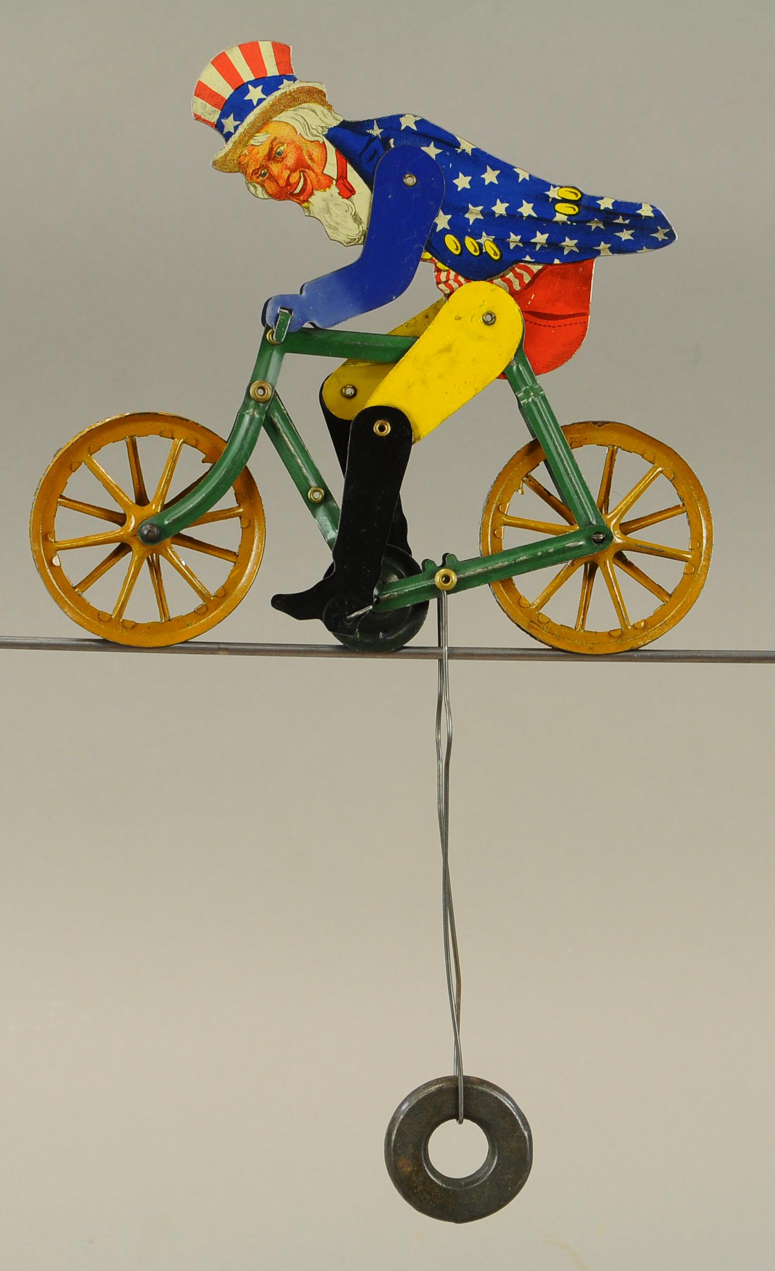 UNCLE SAM BICYCLE GRAVITY TOY: 160. UNCLE SAM BICYCLE GRAVITY TOY | All Original Condition. | $50 - $100