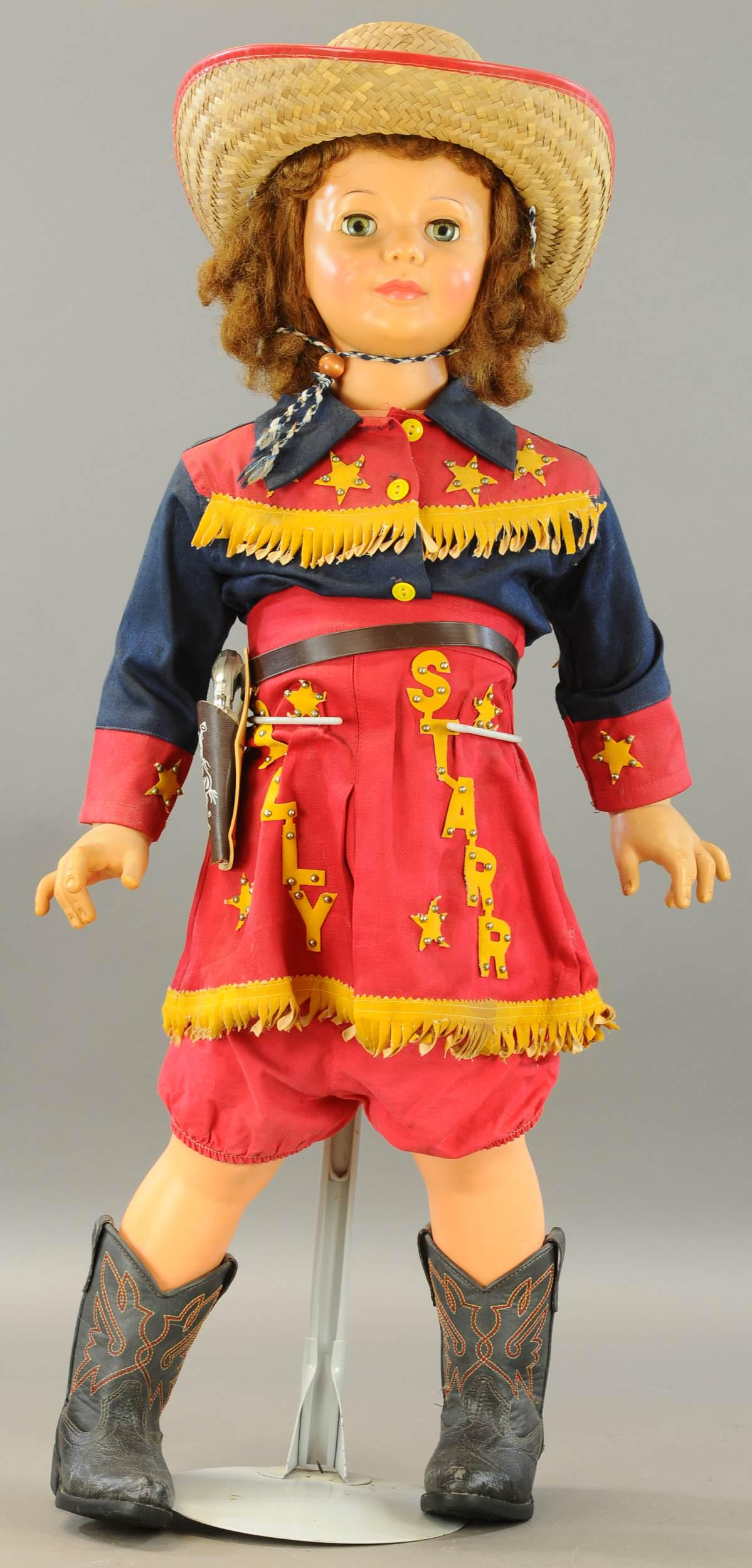 PATTI PLAY PAL SALLY STAR: 221. PATTI PLAY PAL SALLY STAR | Sally Star life-size child doll, complete with six shooter gun & leather boots. Ron Rhoads Auction 2011 - $250. | 36" h. | (Exc. Cond.) | $200 - $300