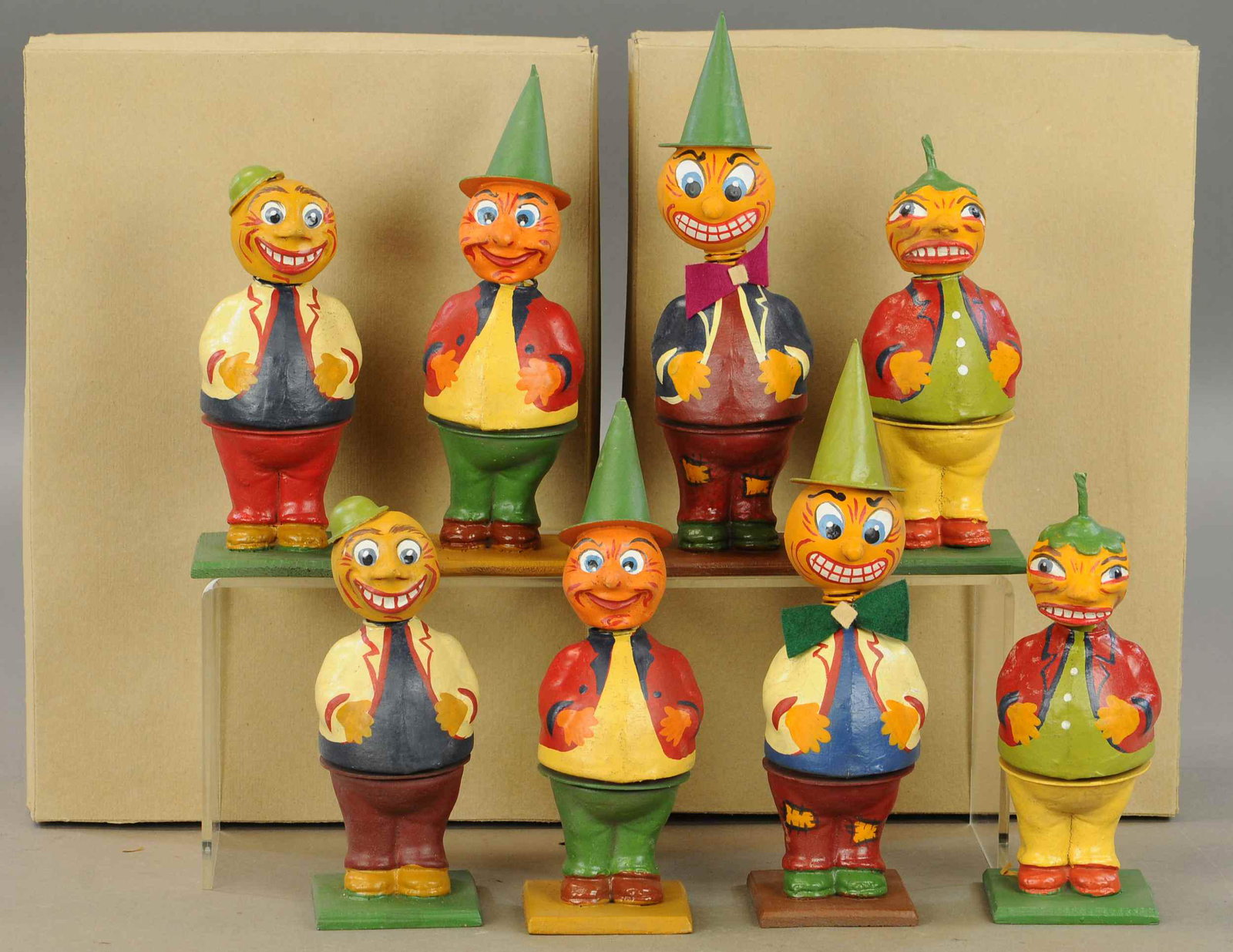 BOXED JACK-O-LANTERN MEN CANDY CONTAINERS: 246. BOXED JACK-O-LANTERN MEN CANDY CONTAINERS | NODDERS | 8" - 9" h. | Contemporary. | $300 - $600