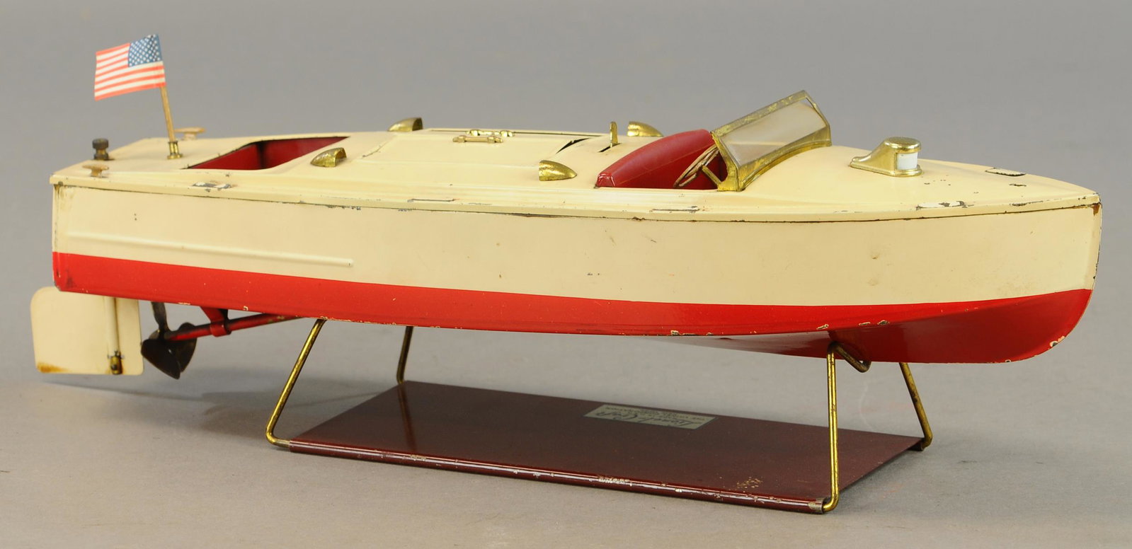 LIONEL #43 SPEEDBOAT: 270. LIONEL #43 SPEEDBOAT | 17" l. | Missing driver figures, paint and stand in All Original Condition. | $500 - $1,000