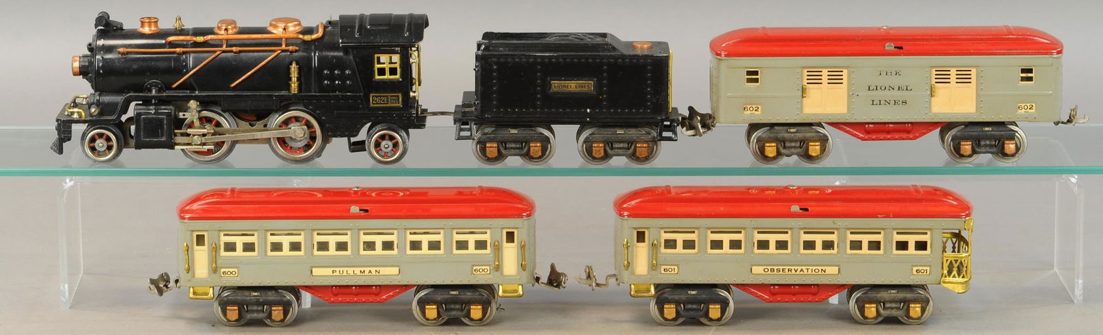 LIONEL 600 SERIES PASSENGER SET: 322. LIONEL 600 SERIES PASSENGER SET | Gauge O, electric. | Loco & tender 15" l. | One hand rail missing from coach, otherwise in All Original Condition. | $200 - $400