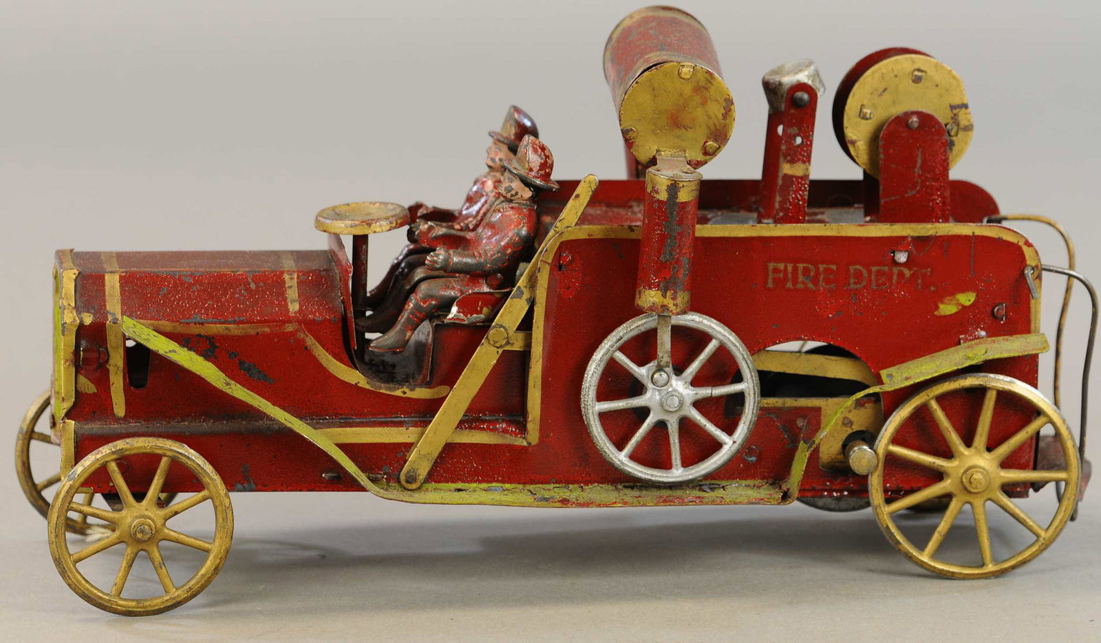 DAYTON FIRE PUMPER W/ FIGURES: 586. DAYTON FIRE PUMPER W/ FIGURES | 14" l. | Split at side piston where meets body, otherwise in All Original Condition. | $200 - $400