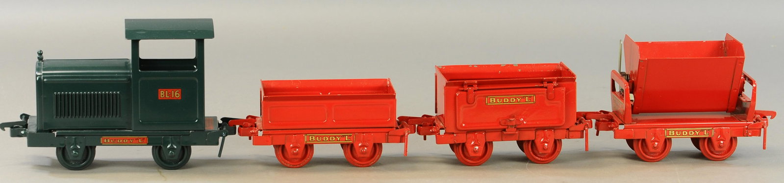 BUDDY L INDUSTRIAL RR SET: 605. BUDDY L INDUSTRIAL RR SET | 10" l. | Ballast car is original, other cars and loco are Professionally Restored. | $350 - $700