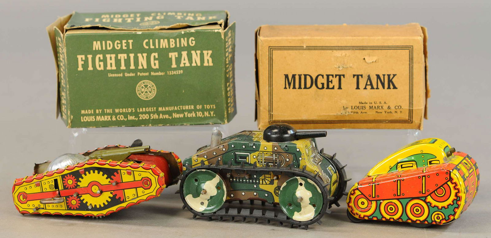 GROUPING OF MARX WIND-UP TANKS: 681. GROUPING OF MARX WIND-UP TANKS | 4x5.5" l. | All Original Condition. | $100 - $200