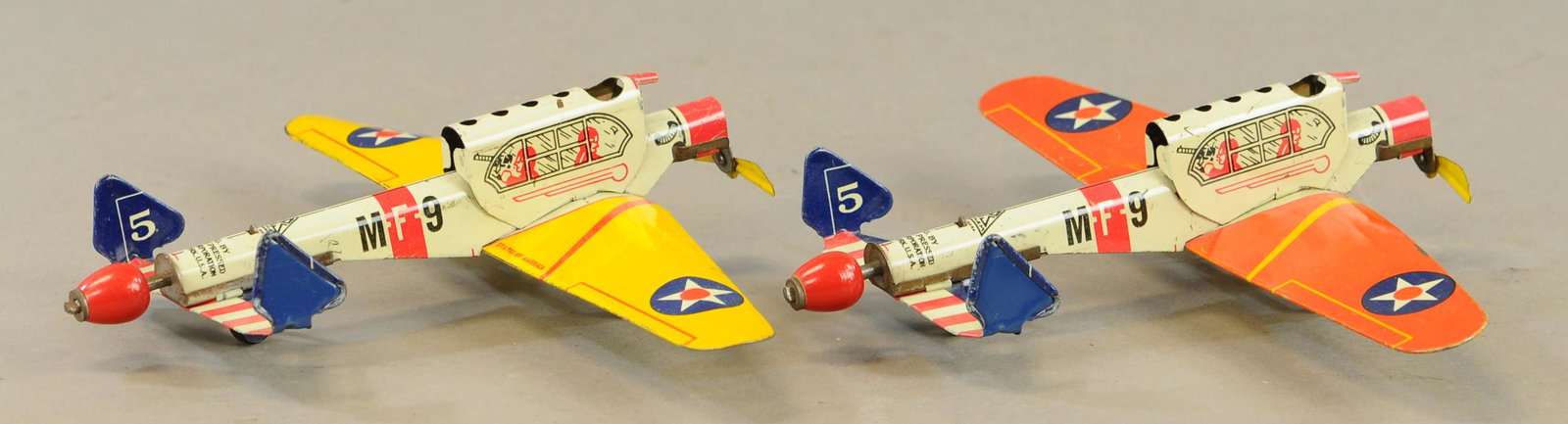 TWO GOTHAM RAPID FIRE PURSUIT PLANES: 705. TWO GOTHAM RAPID FIRE PURSUIT PLANES | 10" l. | All Original Condition. | $150 - $300