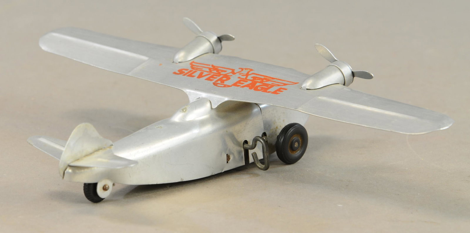 STRAUSS SILVER EAGLE AIRPLANE: 709. STRAUSS SILVER EAGLE AIRPLANE | 13" l. | All Original Condition. | $75 - $150