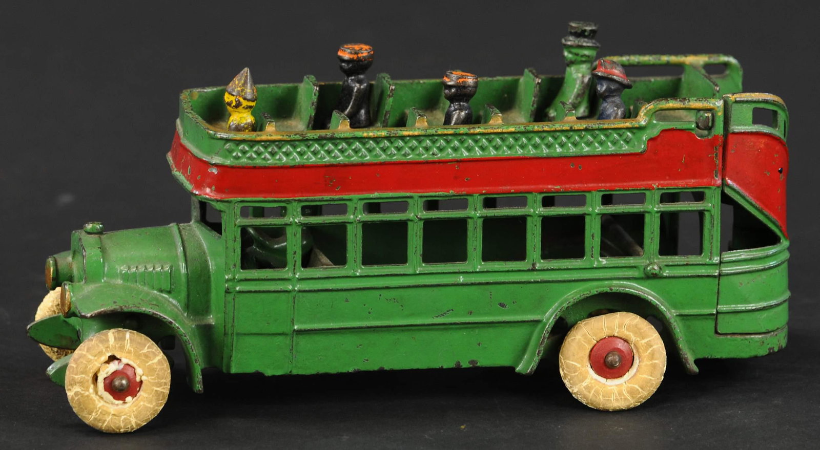 KENTON DOUBLE DECKER BUS: 57. KENTON DOUBLE DECKER BUS | Second to largest size in the series, with painted figures. | 10" l. | (Very Good to Excellent Condition) | $500 - $750