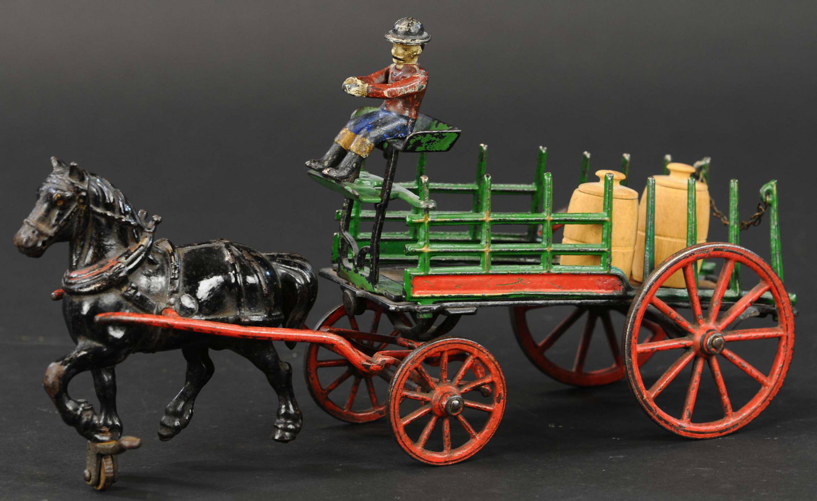 PRATT & LETCHWORTH DRAY CART: 101. PRATT & LETCHWORTH DRAY CART | 13" l. | Repair at middle stake side panels [behind rear wheels], overall in (Excellent Condition) | $700 - $1,000