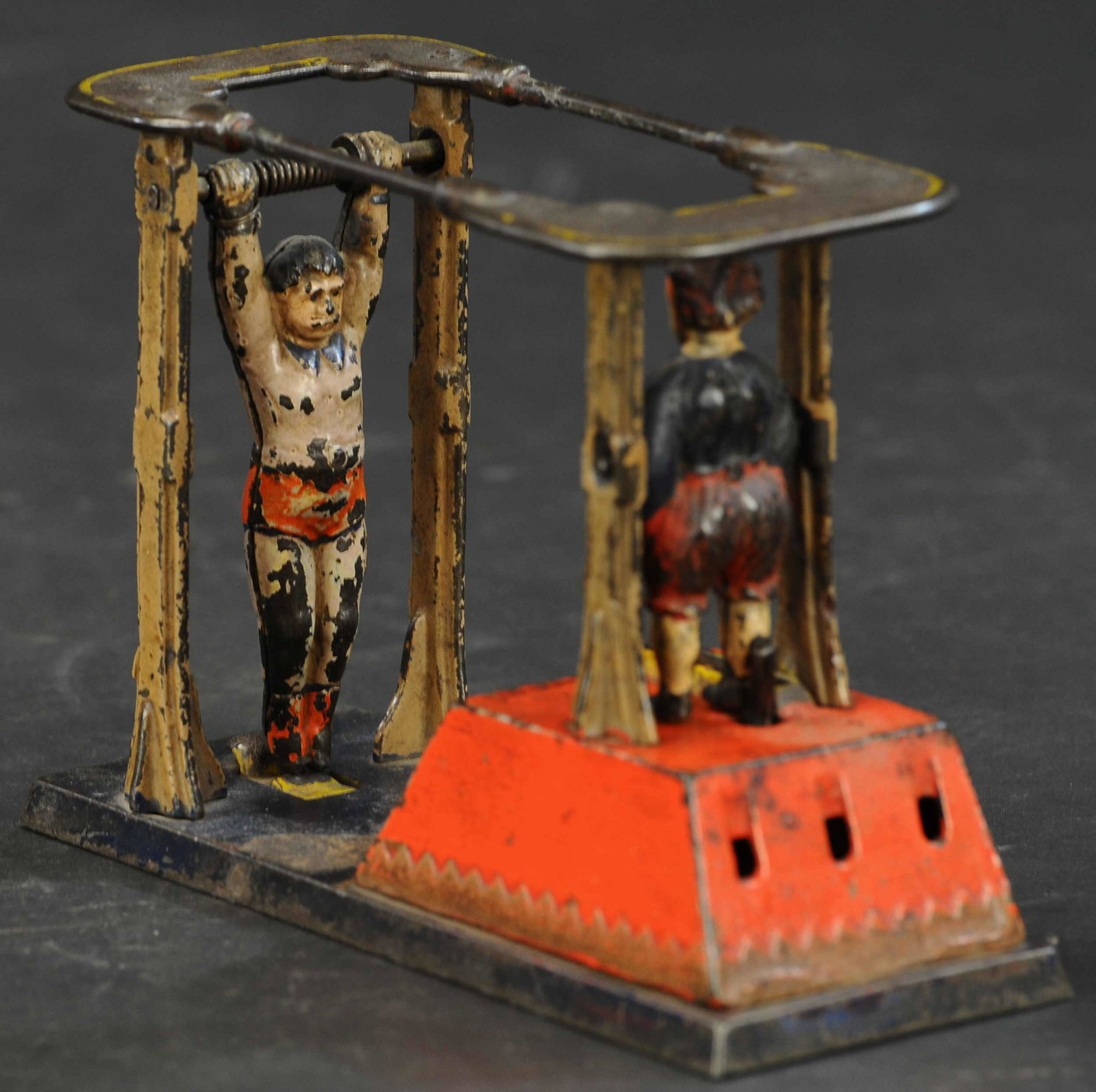 ACROBAT MECHANICAL BANK: 164. ACROBAT MECHANICAL BANK | J&E Stevens Co., circus theme bank features standing clown with trapeze artist who accidentally kicks him backward and causes coin deposit, clever design with fast sprin