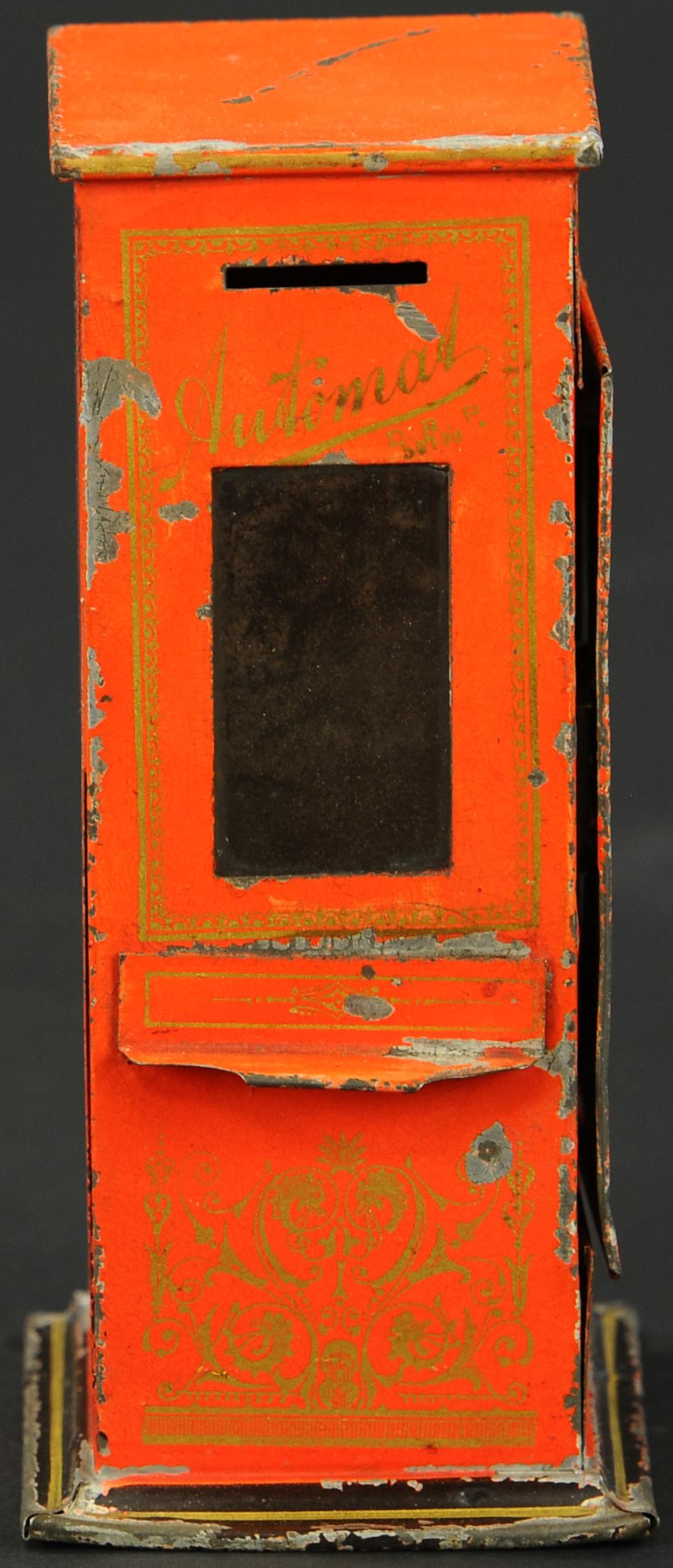 BING CHOCOLAT VENDING BANK: 180. BING CHOCOLAT VENDING BANK | Germany, lithographed tin vending bank. | 7" h. | (Excellent Condition) | $500 - $750