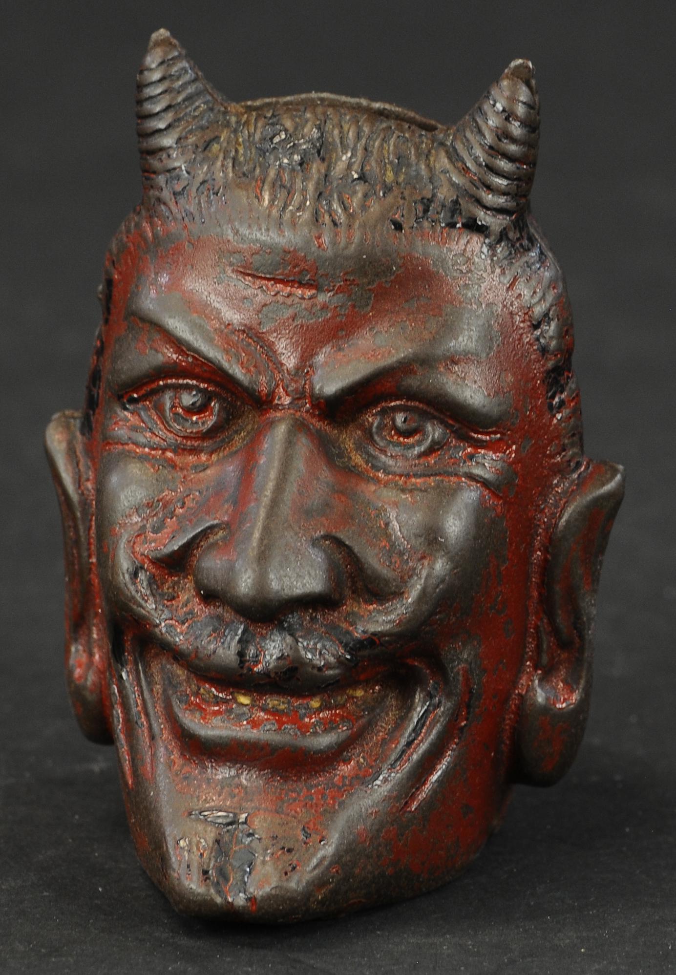TWO-FACE DEVIL STILL BANK: 210. TWO-FACE DEVIL STILL BANK | 4.5" h. | (Very Good Condition) | $700 - $1,000