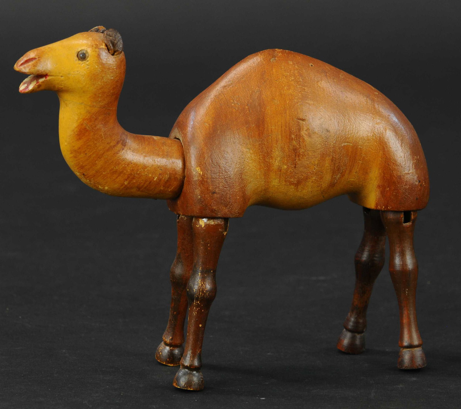 SCHOENHUT GLASS EYED ARABIAN CAMEL: 442. SCHOENHUT GLASS EYED ARABIAN CAMEL | 9" l. | Missing tail, otherwise in (Pristine Condition) | $200 - $400