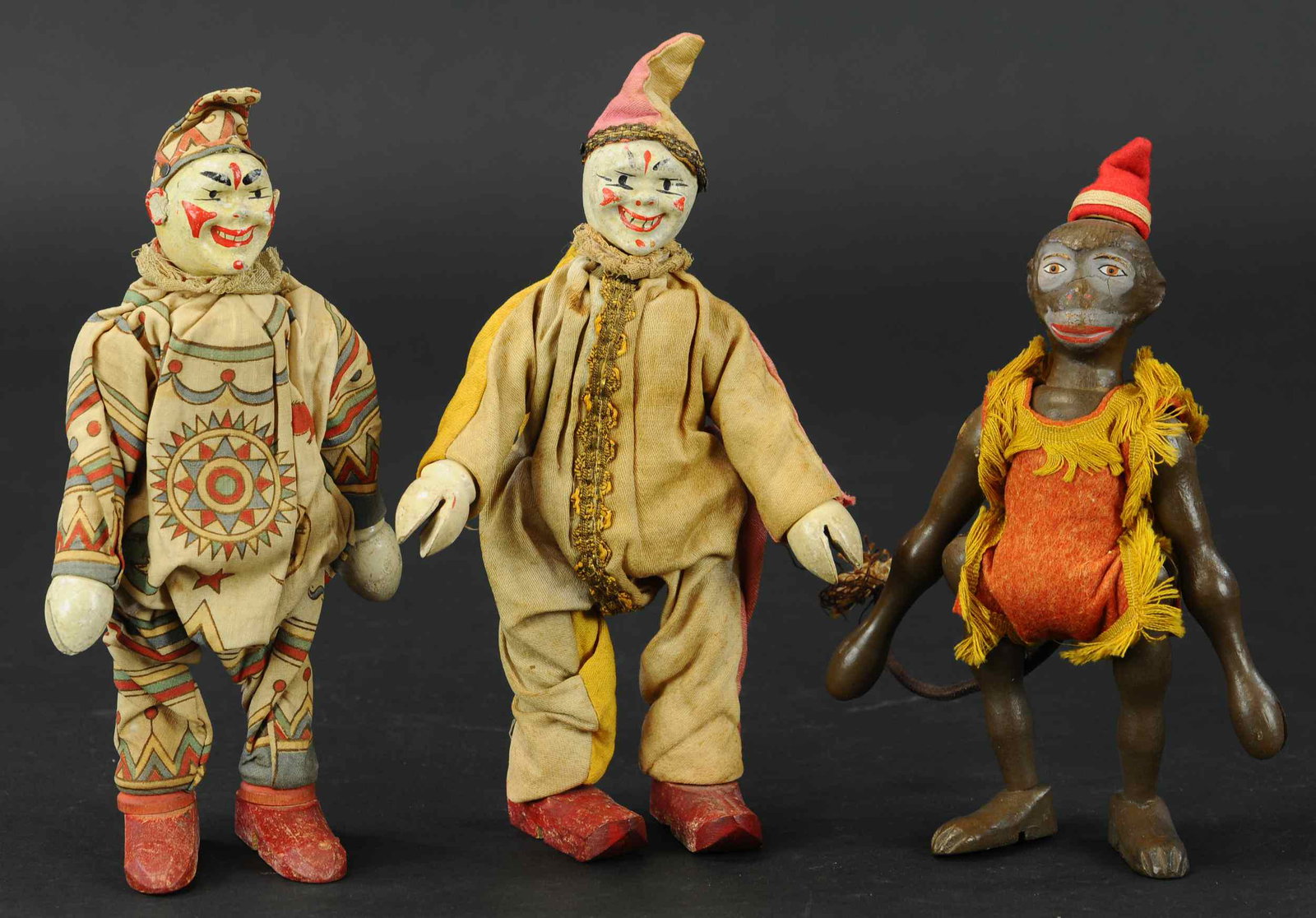 SCHOENHUT CIRCUS MONKEY & CLOWNS: 454. SCHOENHUT CIRCUS MONKEY & CLOWNS | 7" - 8" l. | (Pristine Condition) overall. | $400 - $600