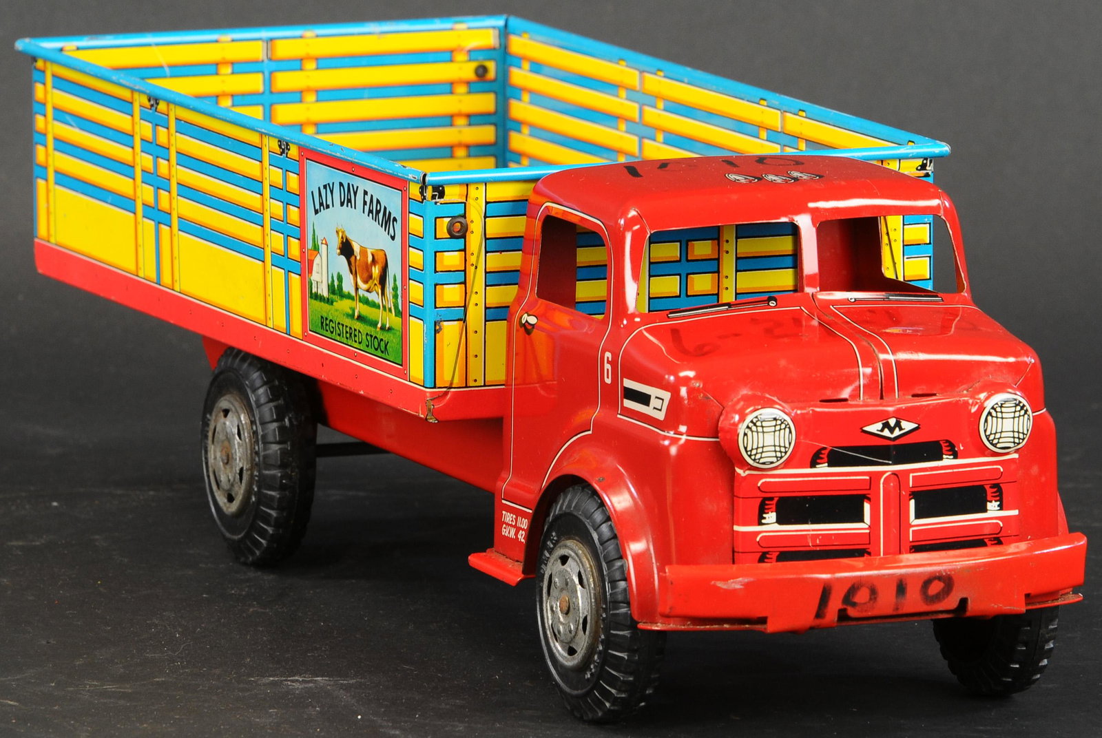 MARX LAZY DAY FARMS TRUCK PROTOTYPE: 510. MARX LAZY DAY FARMS TRUCK PROTOTYPE | Interior of bed and roof of cab marked in black marker, denoting serial numbers and date. | 18" l. | (Pristine Condition) | $200 - $300