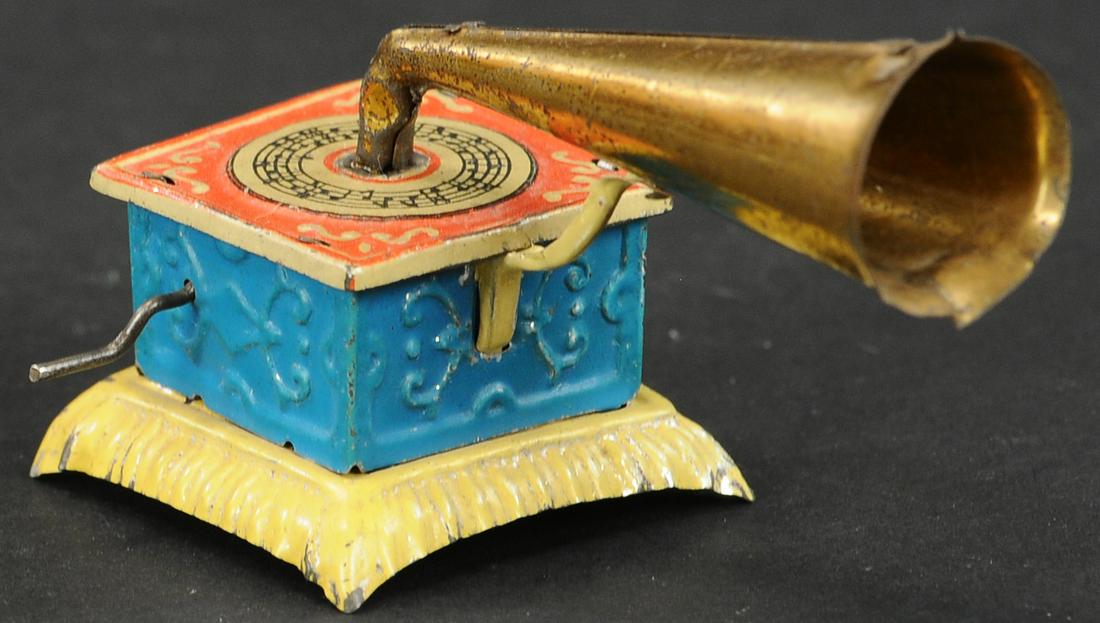 MEIER PHONOGRAPH PENNY TOY: 1164. MEIER PHONOGRAPH PENNY TOY | 3.5" l. | (Excellent Condition) | $200 - $300