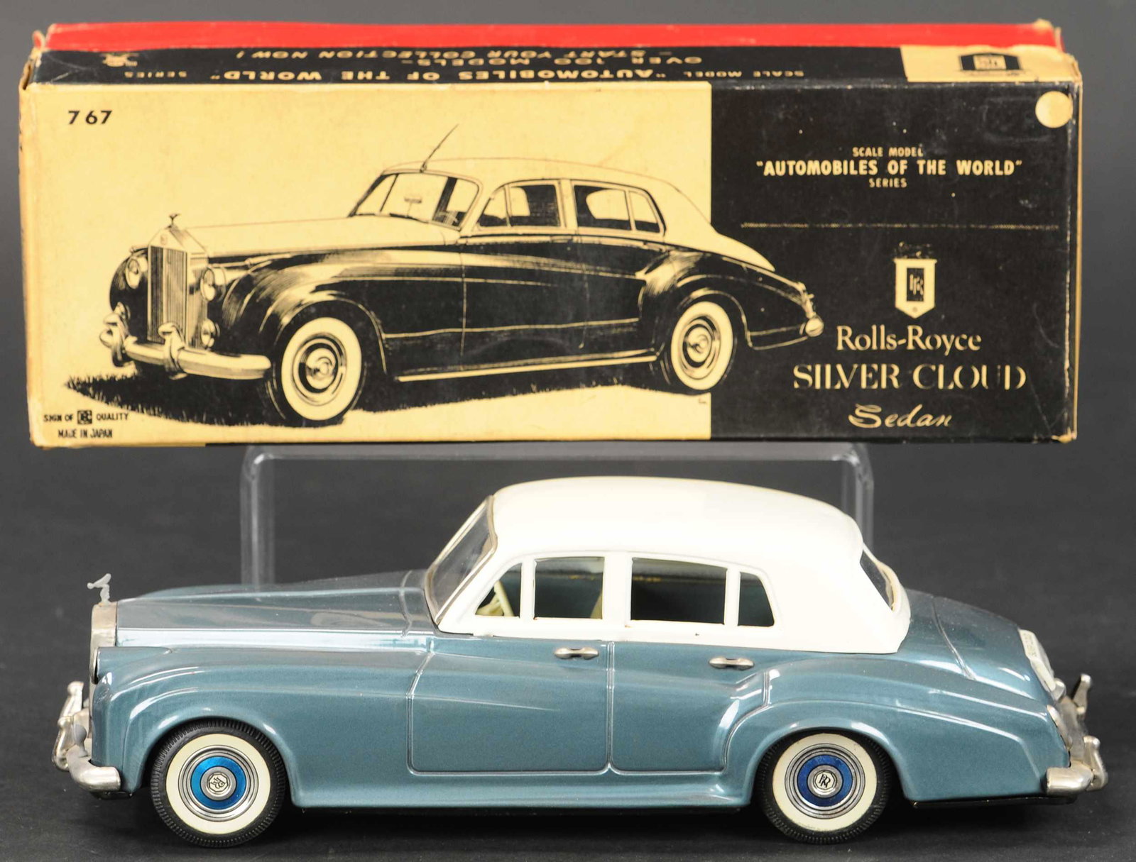 BOXED BANDAI ROLLS ROYCE SILVER CLOUD: 1211. BOXED BANDAI ROLLS ROYCE SILVER CLOUD | Late 1950s Rolls-Royce Silver Cloud tin litho friction driven car with box. | 12" l. | Tape to inside flap, minor crushing to box bottom, toy in (Pristine
